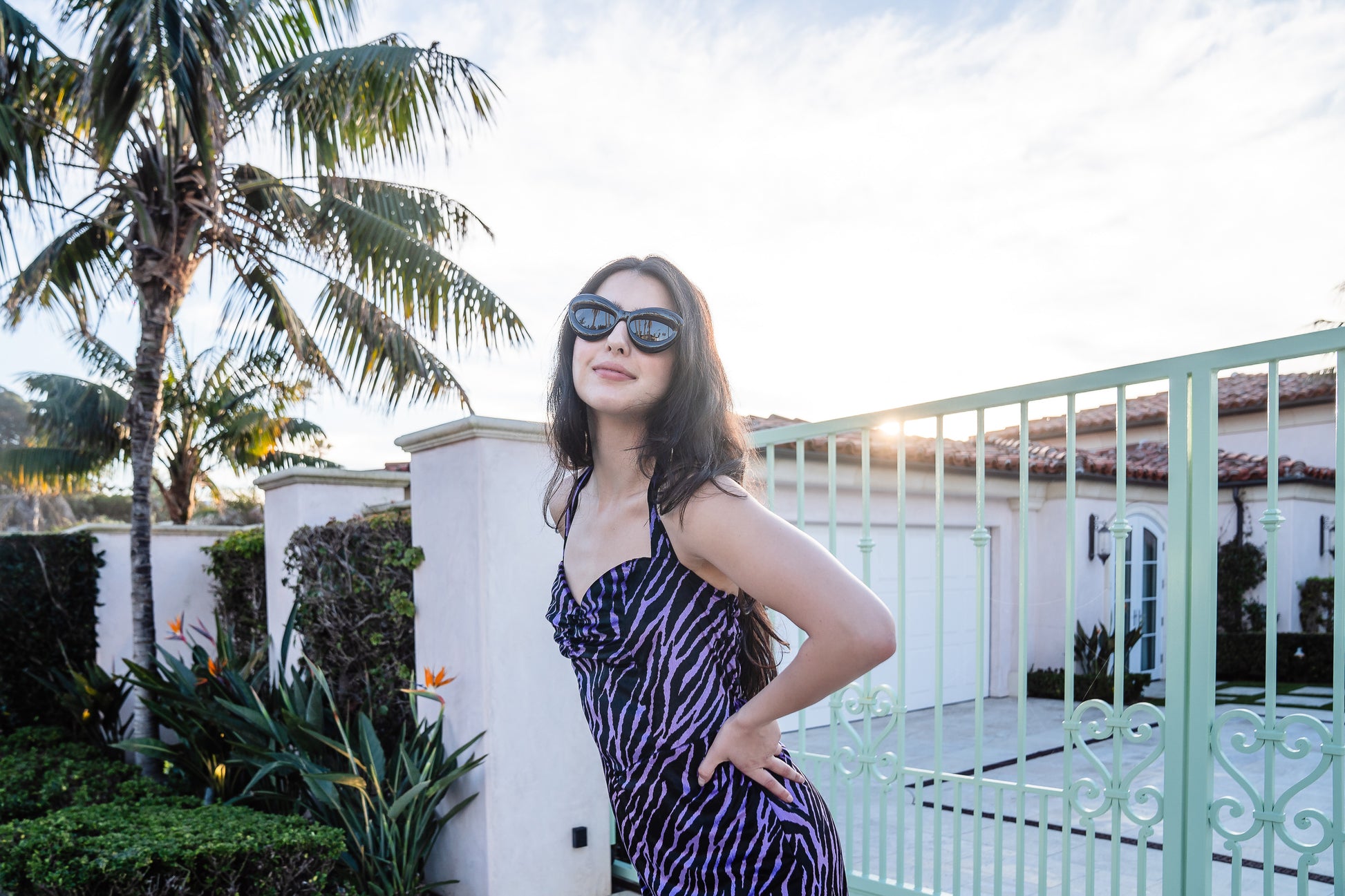 The Betty Tiger Halter dress by Jennafer Grace combines sleek and retro sexy with a touch of glamour. The velveteen, bodycon design accentuates your curves, while the elastic shirred back bust allows for flexibility in between sizes.