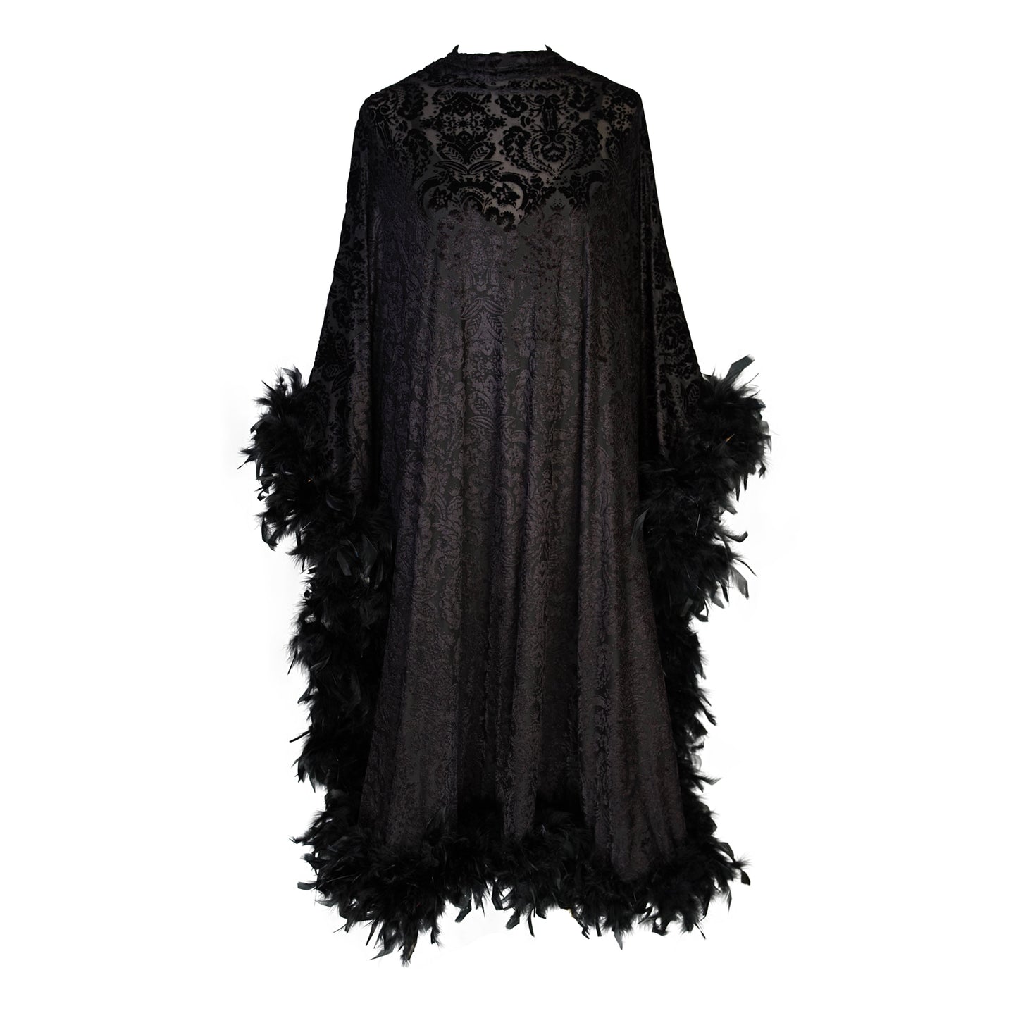 The Black Widow Mockneck Feather Caftan with slip. A darkly romantic, semi-sheer, black stretch velvet kaftan with a vintage-inspired, ornamental burnout pattern and soft black feather border along sleeves and hem. A gothic bohemian dress inspired by Old Hollywood glam.