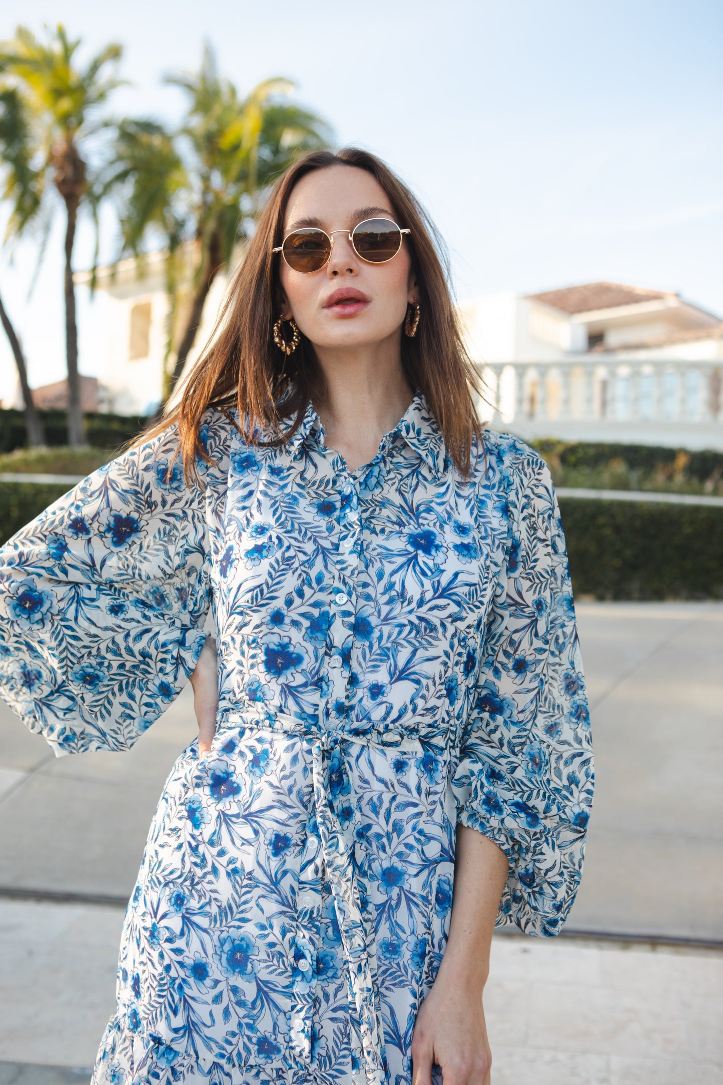 jennafer grace Bluebelle Bookie Maxi Dress white with modern cobalt blue watercolor floral print collared button up maxi dress cinched waist belt bishop sleeves boho bohemian hippie romantic whimsical summer holiday dress handmade in California USA