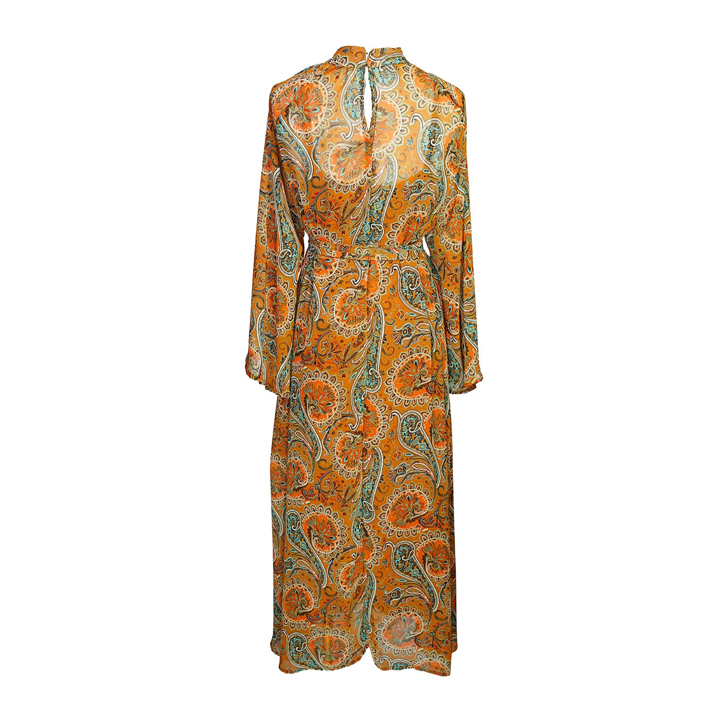 Model wears a soft chiffon midi length dress in caramel brown with turquoise, green and orange paisley print. The sleeves are bell shaped and the dress has a wrap around belt