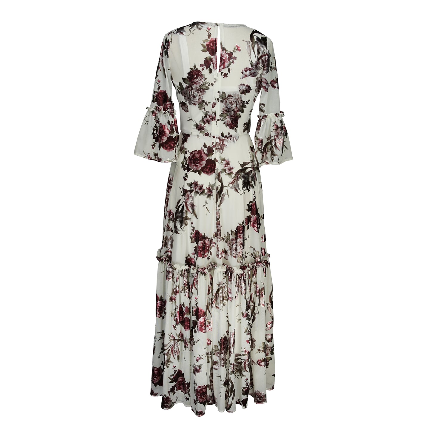 An airy ruffled maxi dress. Made with an airy and metallic detail floral mesh fabric featuring pockets, mid-length bell sleeves, and a full, single-tiered skirt with ankle hem. Includes a matching slip dress that can be worn on its own.