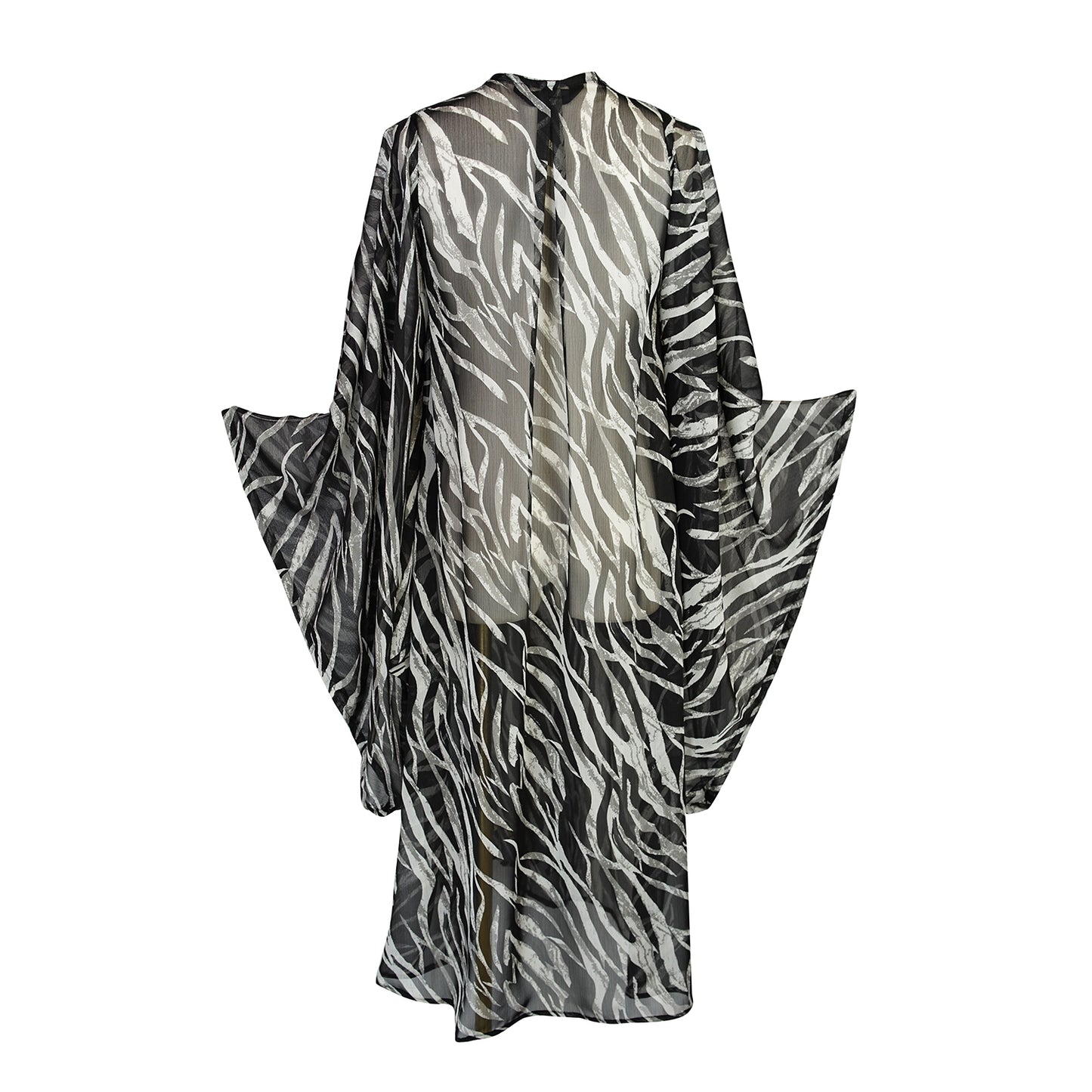 Black and white zebra print kimono with belt. Can be worn open as a robe or wrap dress. Long flowy sleeves with ankle hem. Made from semi sheer rayon chiffon fabric.