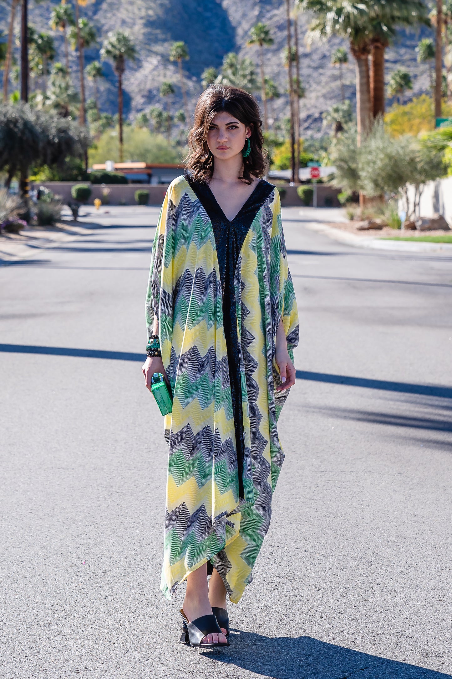 Jennafer Grace Fortuna Deluxe caftan black green yellow white striped chevron print with black sequin lapel down front and back, creating a Y shaped design. V neck with batwing sleeves and ankle length hem.  Unisex handmade in California USA
