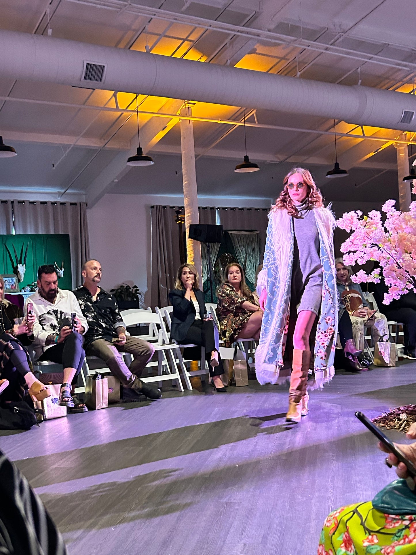 Long, penny lane style trench coat fashioned from a thick, mint green fabric embroidered with ivory snakes. Embellished with long ivory faux fur along collar, lapel, cuffs, and hem. Bohemian maximalism in style.