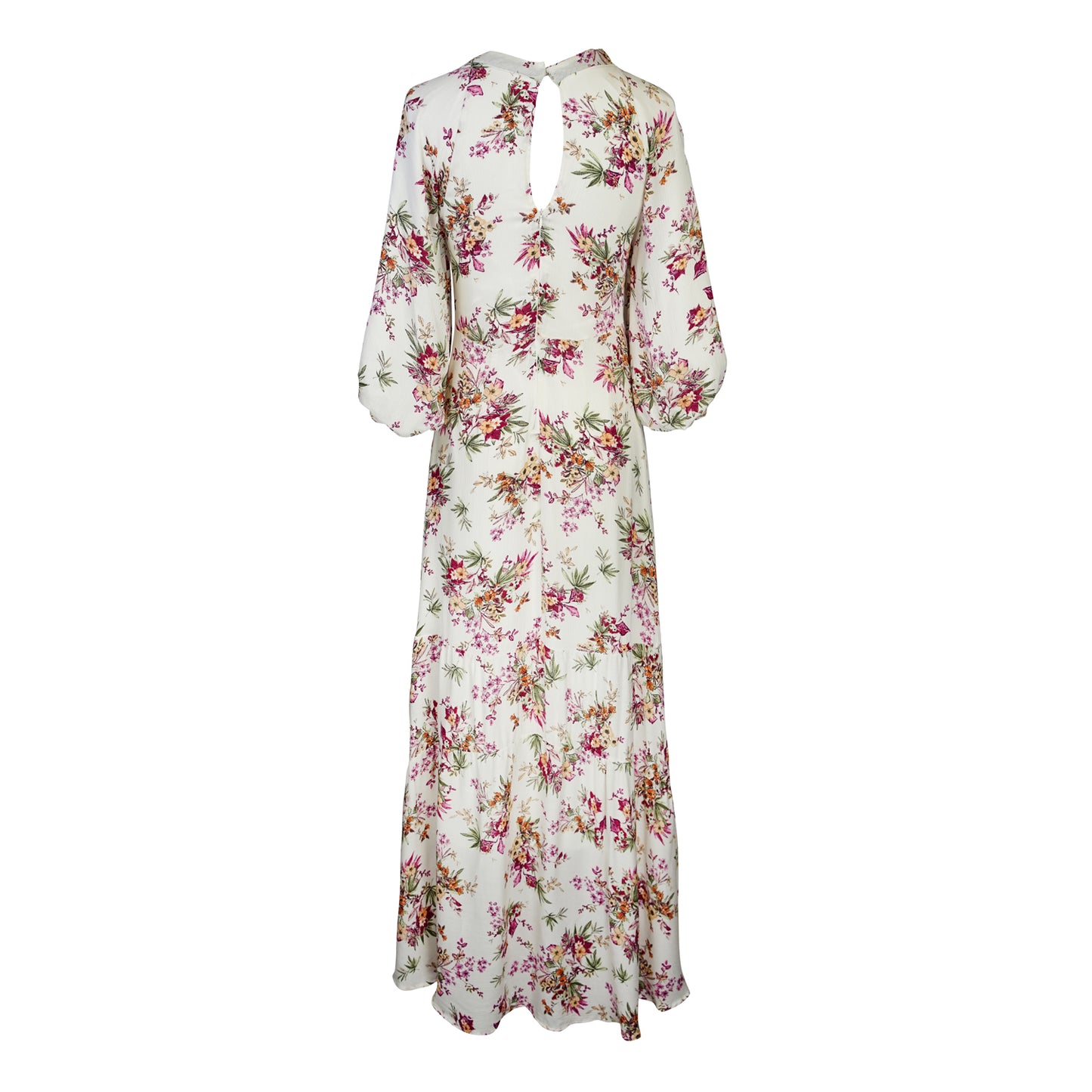 The Vana Vixen maxi dress by Jennafer Grace with a white base and summer floral print of deep pinks, yellows, and greens. Made from a linen like cotton rayon frabric, featuring a v-neck, detailed bishop sleeves, tiered ruffle skirt with ankle length hem, and a keyhole slit at back.