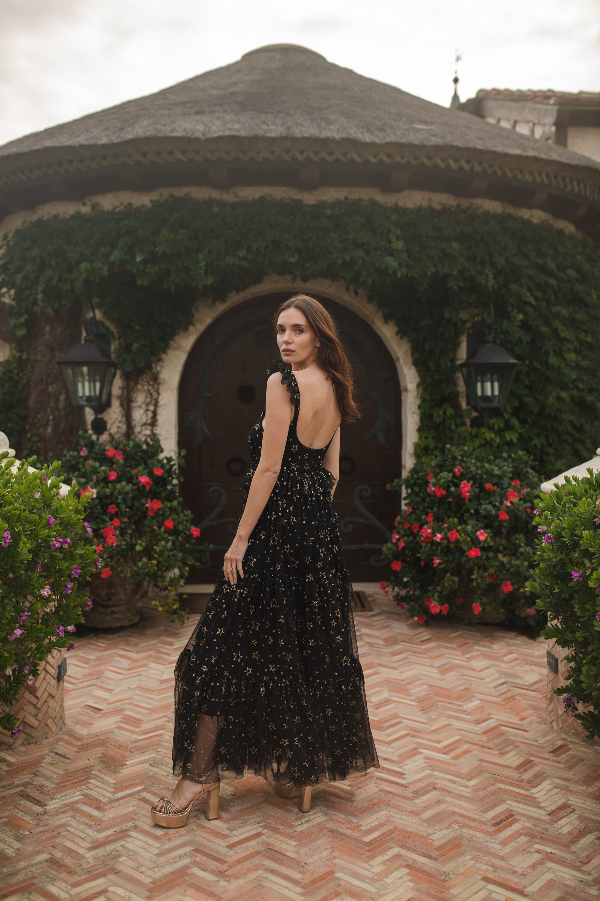 jennafer grace Midnight Sky Tulle Maxi Dress black semi-sheer lined layered tulle maxi dress with metallic gold foil star print ruffle straps starry gothic boho bohemian hippie dark romantic whimsical evening gown cocktail party statement piece handmade in California USA