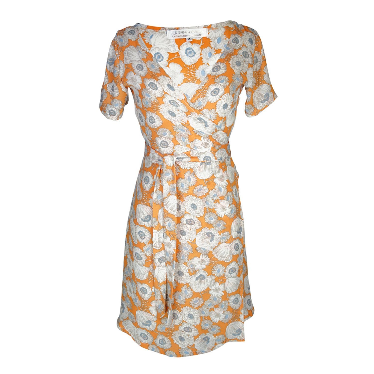 Short-sleeve, v-neck wrap dress. Mini in length, with orange base with white and blue floral poppy flower print. 1960s bohemian summer dress in style.