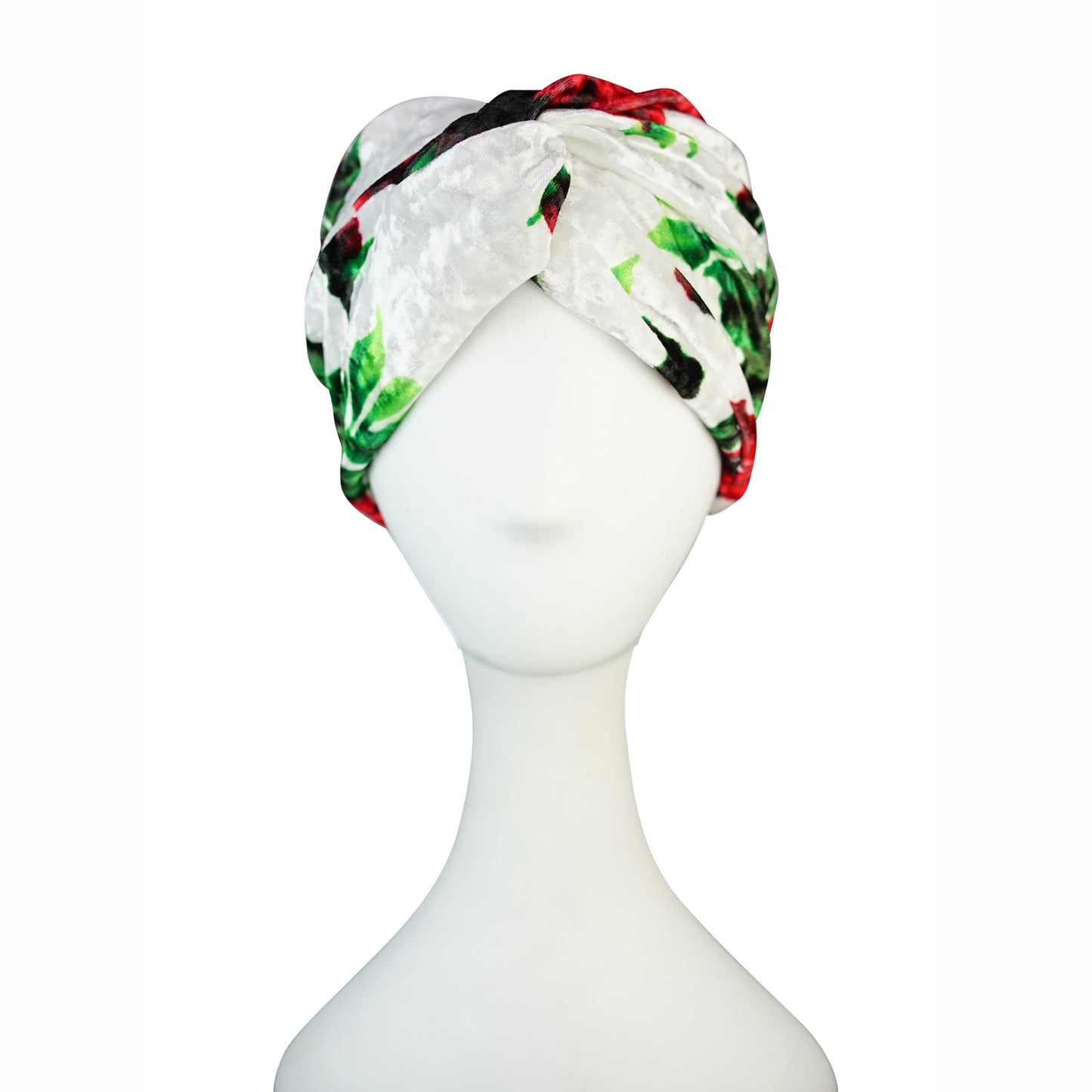 White, green, and red abstract floral print velvet headband with a front twist.