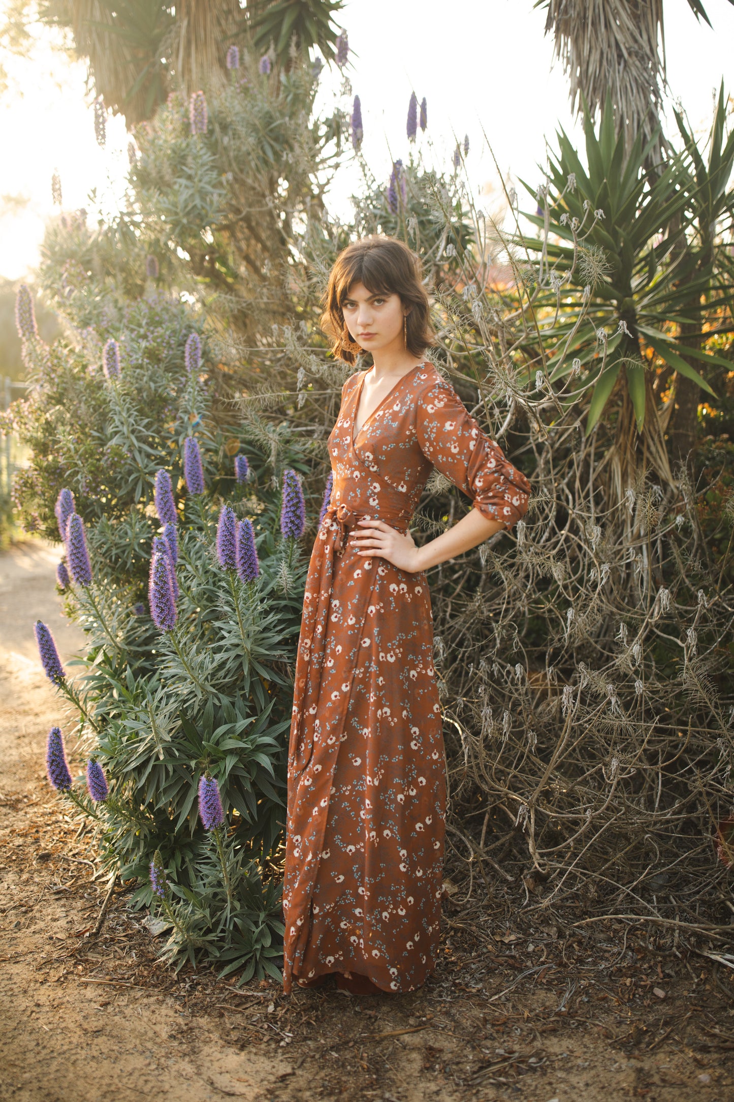 jennafer grace Signature Wrap Dress in Terracotta rustic terracotta orange red maxi dress with pastel floral flower print with long waist tie and ruched sleeves boho bohemian hippie romantic whimsical spring gown wedding guest dress unisex handmade