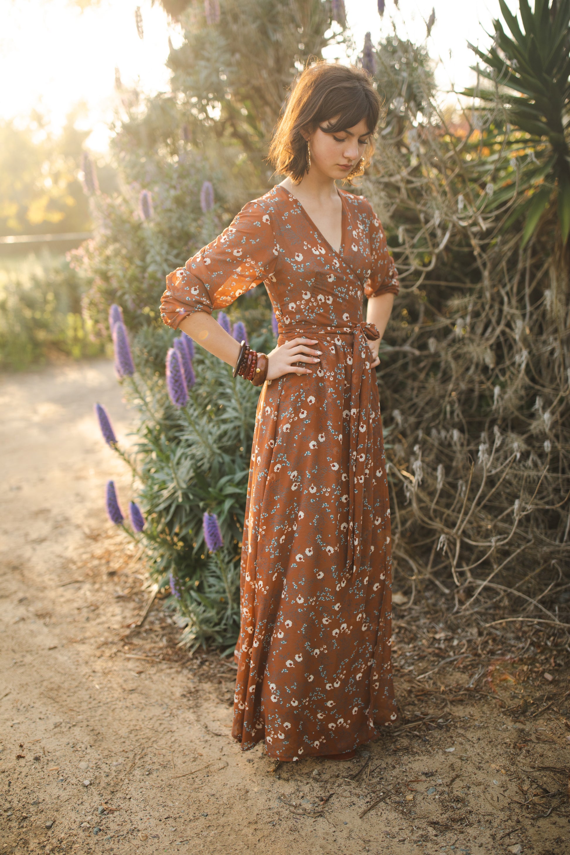 jennafer grace Signature Wrap Dress in Terracotta rustic terracotta orange red maxi dress with pastel floral flower print with long waist tie and ruched sleeves boho bohemian hippie romantic whimsical spring gown wedding guest dress unisex handmade