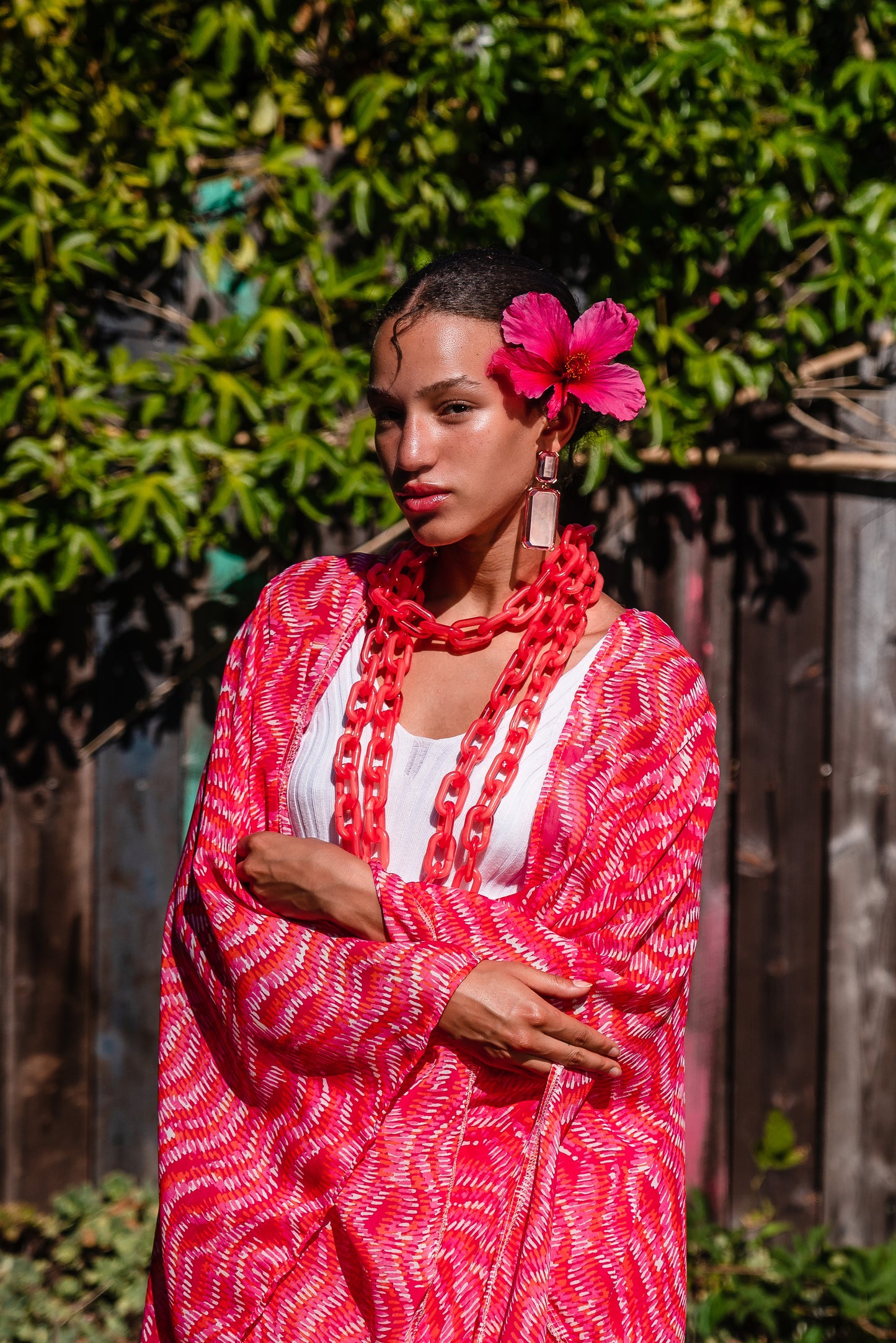 This bold bright kimono was handmade in San Diego, CA with a soft semi sheer rayon chiffon. Featuring pockets and a matching waist tie-you can style this piece in at least 10 ways!