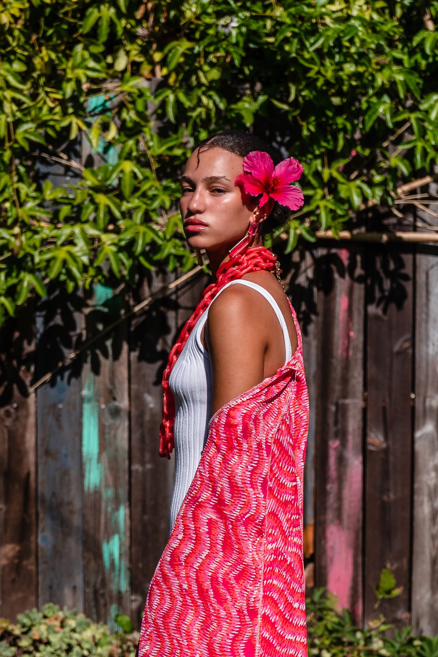 This bold bright kimono was handmade in San Diego, CA with a soft semi sheer rayon chiffon. Featuring pockets and a matching waist tie-you can style this piece in at least 10 ways!