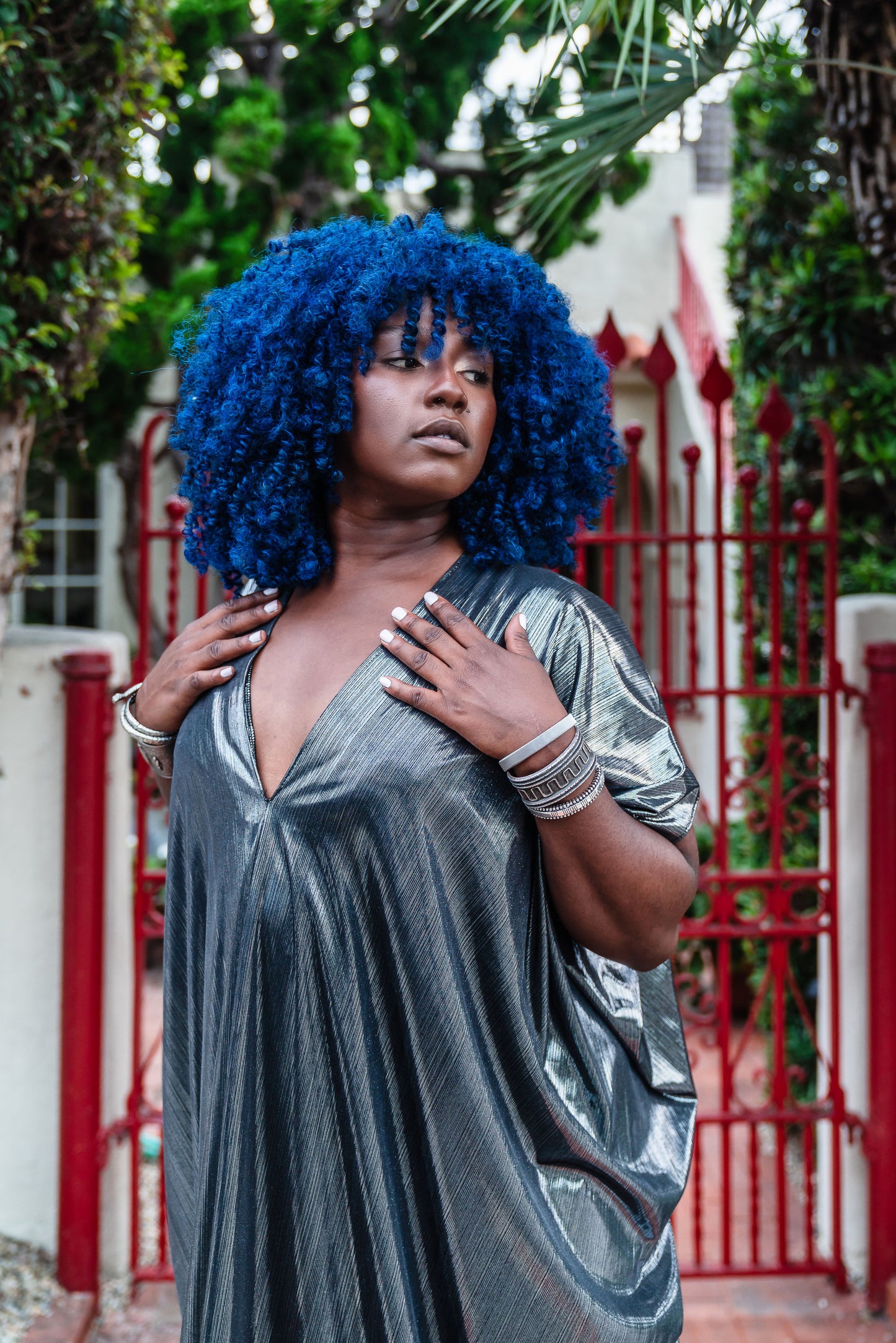 A stunning metallic caftan crafted from a slinky black jersey coated in a gorgeous mercurial foil