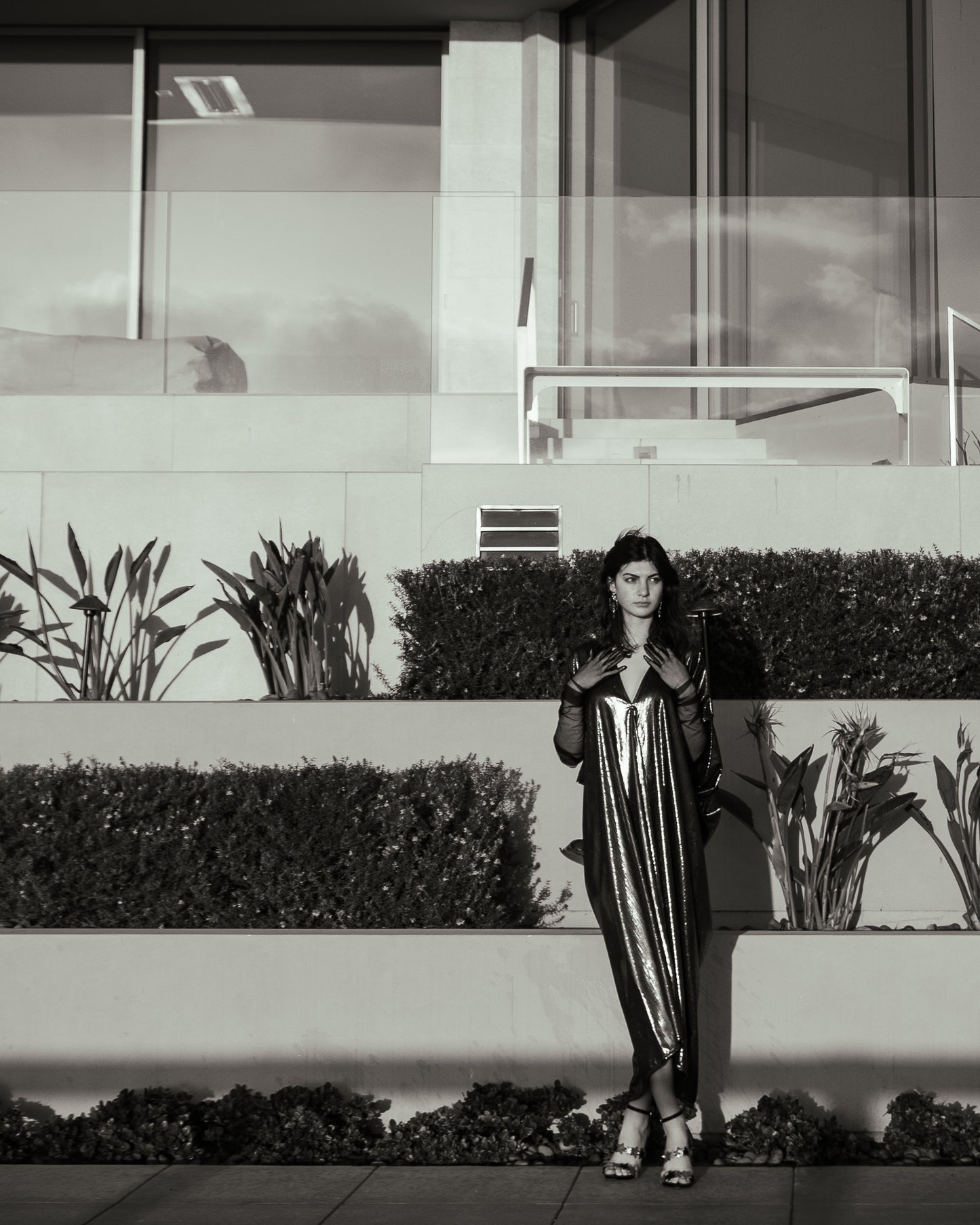 A stunning metallic caftan crafted from a slinky black jersey coated in a gorgeous mercurial foil