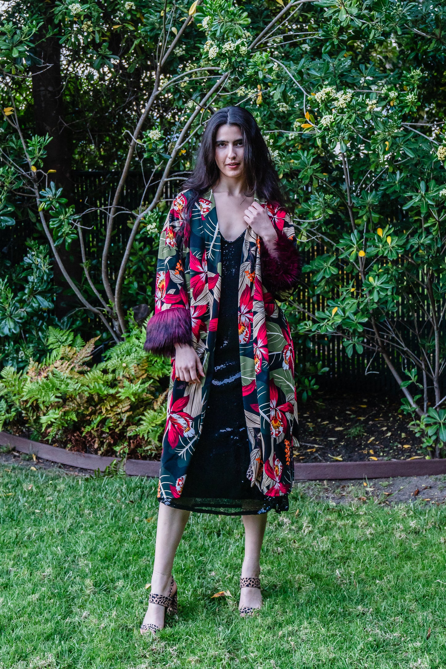 Jennafer Grace Jardin Nuit Faux Fur Koi Kimono red tropical botanical print leopard contrast lining with dark red faux fur cuffs. Duster jacket retro 90s revival with mid length sleeves and knee length hem. Comes with a matching belt to tie around waist. Unisex handmade in California USA