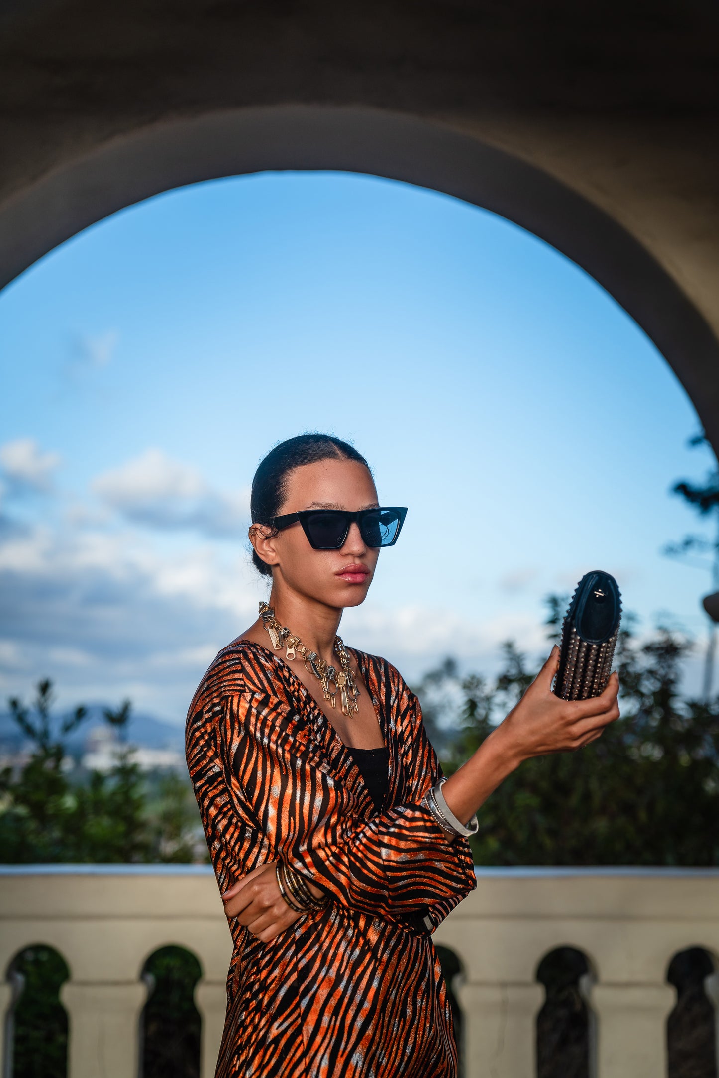 Gold foiled zebra Printed calf length caftan, with sleeves, a v-neck and splits up the side seams to the mid thigh