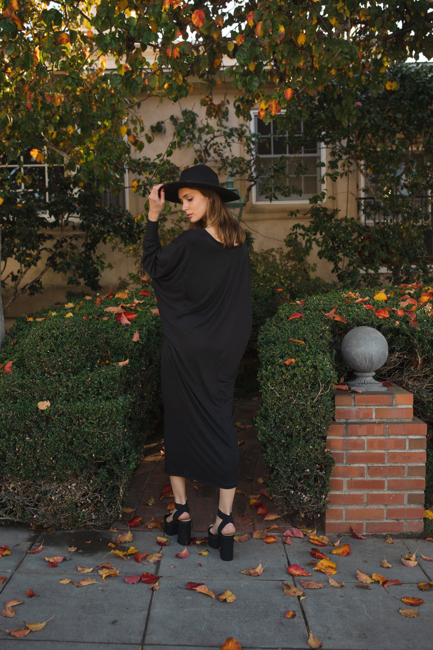 Jennafer Grace Onyx Metamorphosis Dress soft black midi maxi dress batwing sleeves crew neck tapered skirt cozy gothic winter glam goth boho bohemian hippie romantic whimsical unisex handmade in California USA