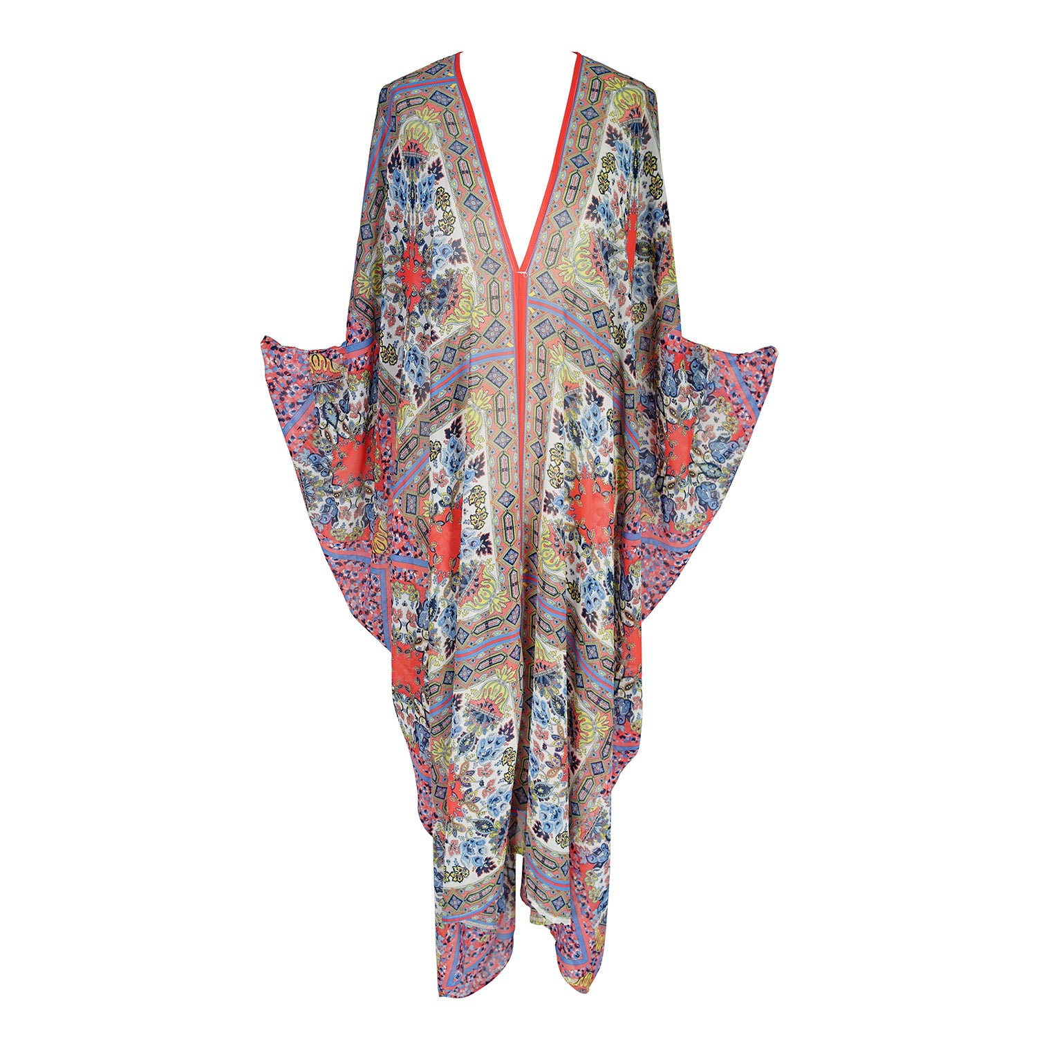 This playful chiffon caftan boasts a generous amount of fabric with vivid mosaic print and pops of peach, blue, and yellow reminiscent of Marrakech.