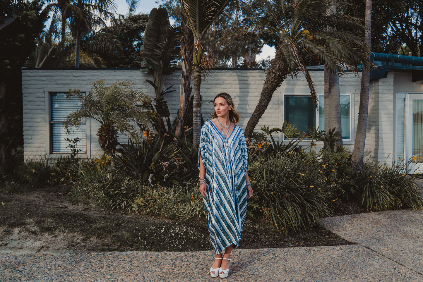 This Yachting inspired caftan has  sequins in stripes of blues and silvers 