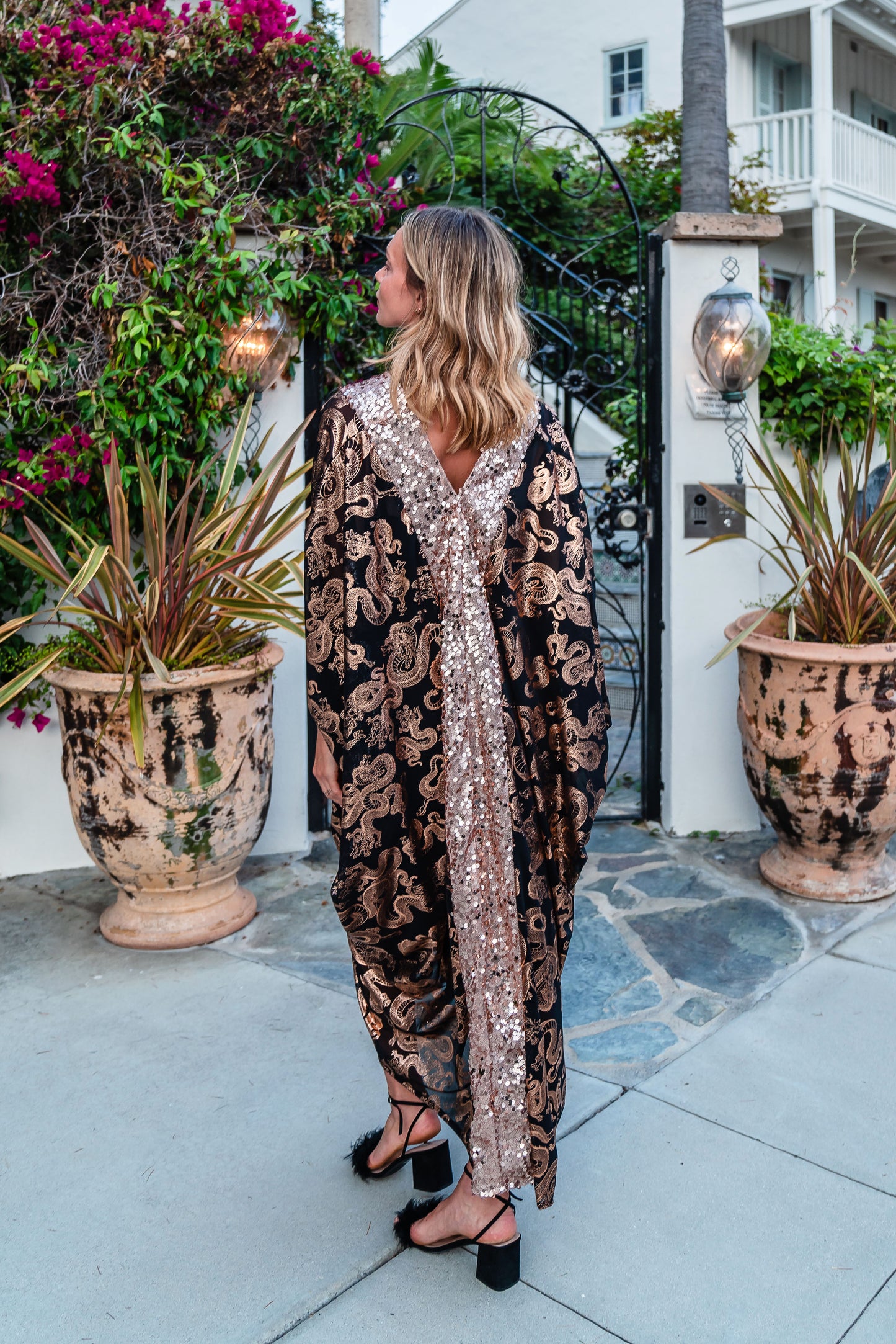 Our lustrous dragon foiled mesh caftan with sequin details is perfect for a summer night out, or as a layering piece in cooler seasons