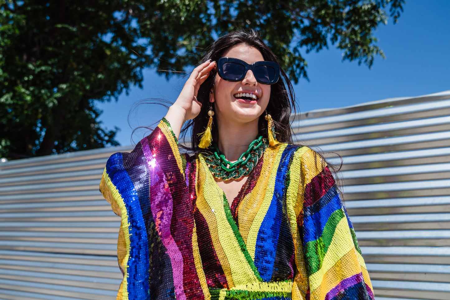 Introducing the Rainbow Road Kimono. This elegant piece boasts an iridescent sequin in a wavy vertical line design with art nouveau inspiration. Featuring an ankle length hem, and drapy rectangular sleeves of a traditional kimono design, and long removeable belt, this kimono can be worn as a stunning dress or layered over your favorite outfits. 