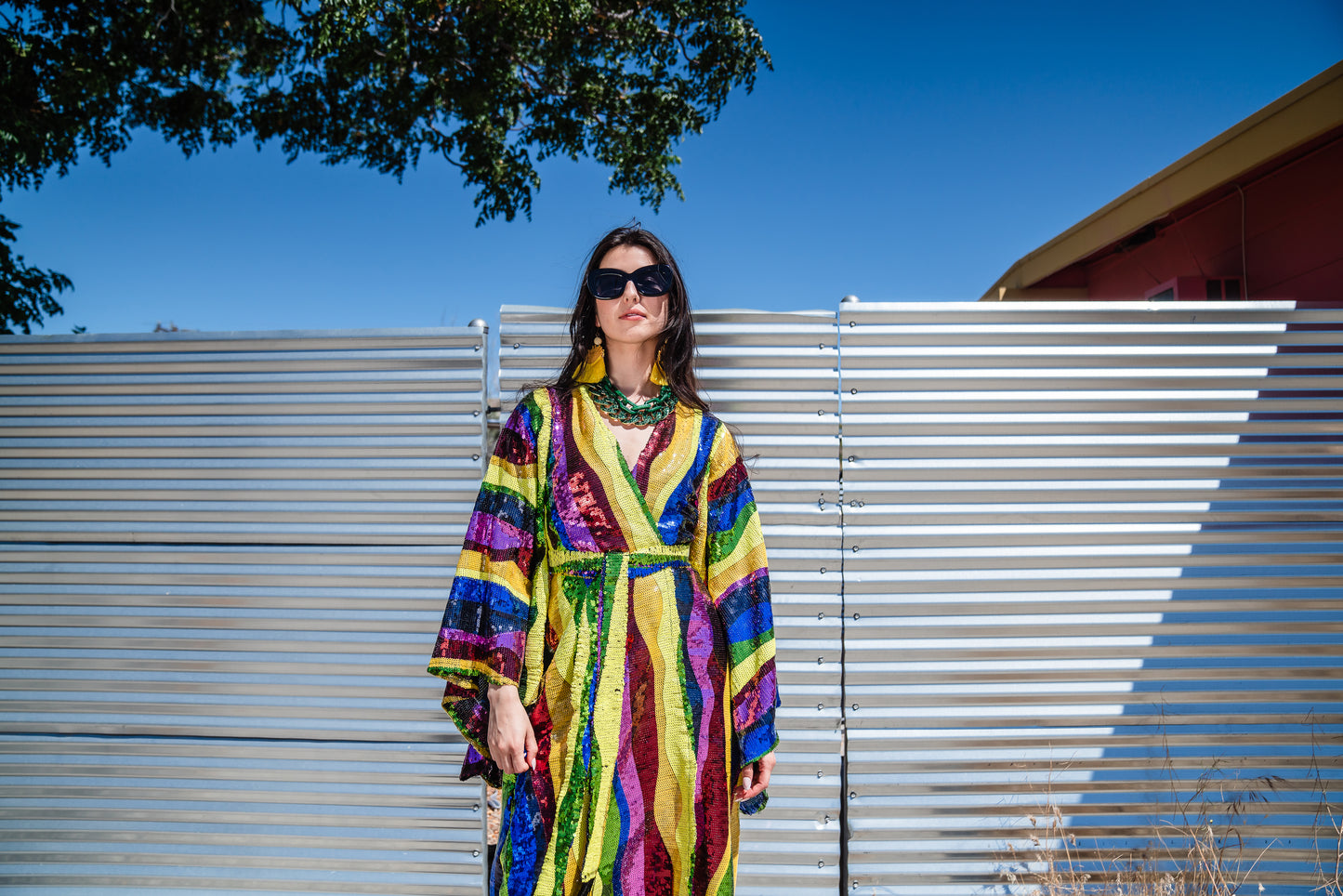 Introducing the Rainbow Road Kimono. This elegant piece boasts an iridescent sequin in a wavy vertical line design with art nouveau inspiration. Featuring an ankle length hem, and drapy rectangular sleeves of a traditional kimono design, and long removeable belt, this kimono can be worn as a stunning dress or layered over your favorite outfits.
