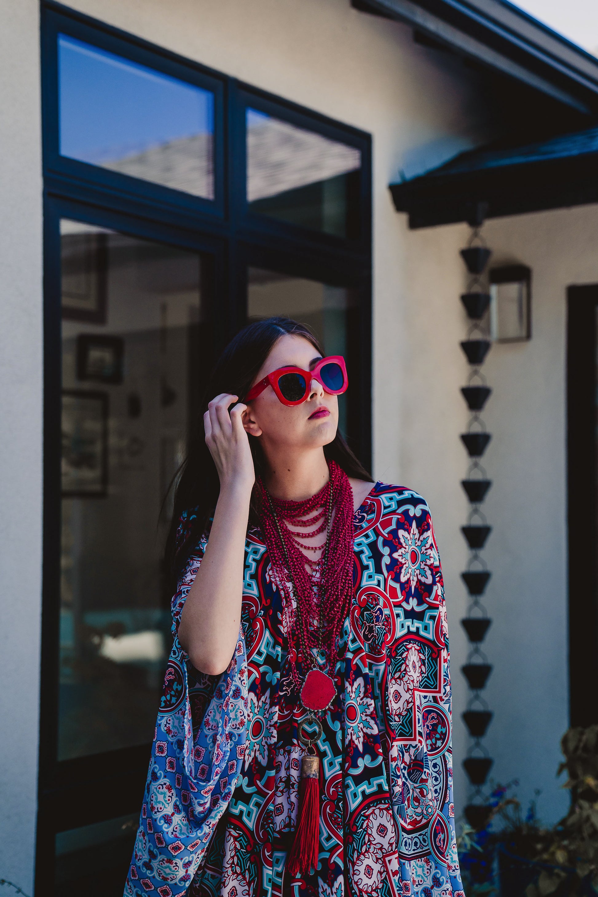 This Persephone Royale Caftan features a beautiful mosaic tile and Greek bird print in royal blue, red, and hints of teal.