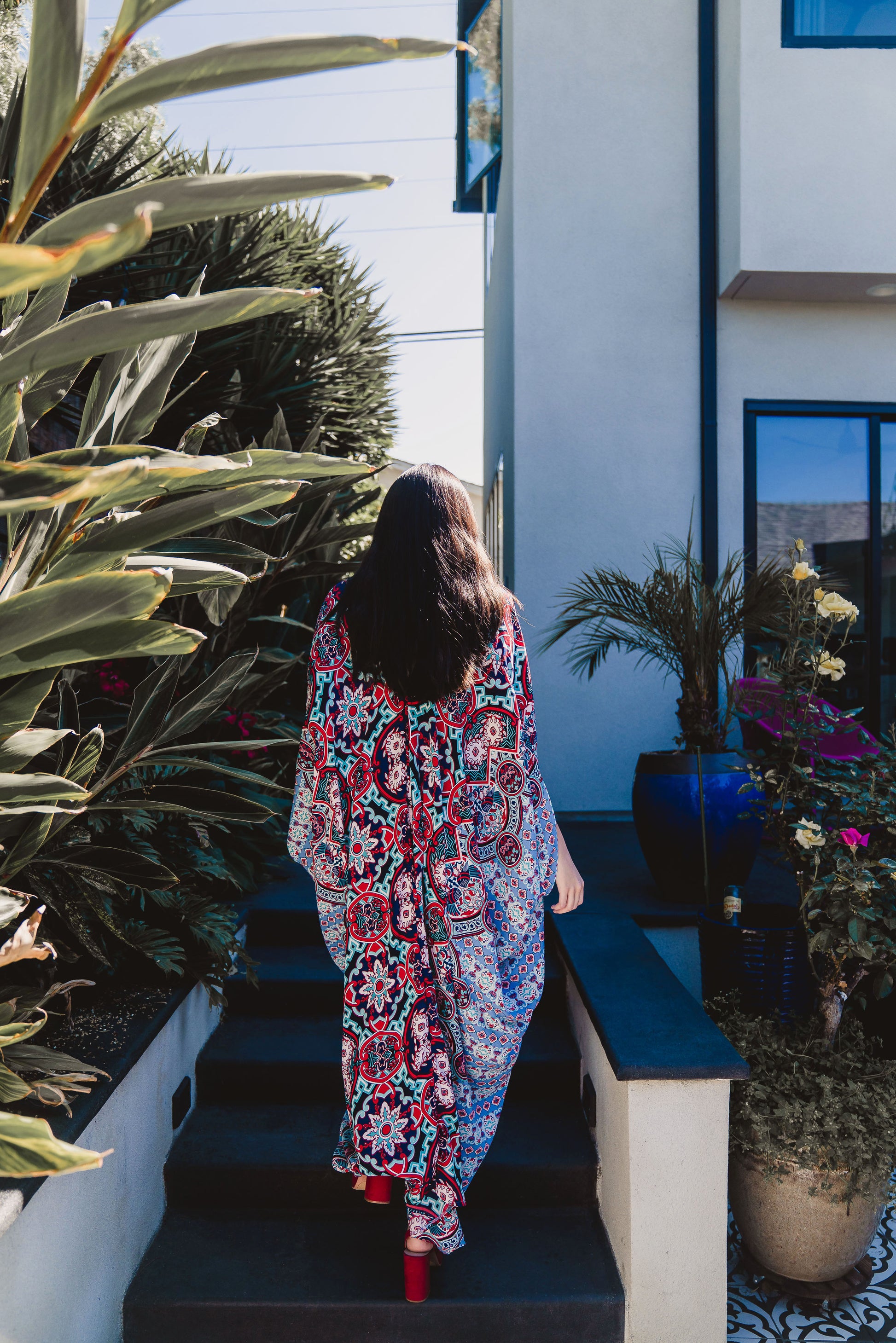 This Persephone Royale Caftan features a beautiful mosaic tile and Greek bird print in royal blue, red, and hints of teal.