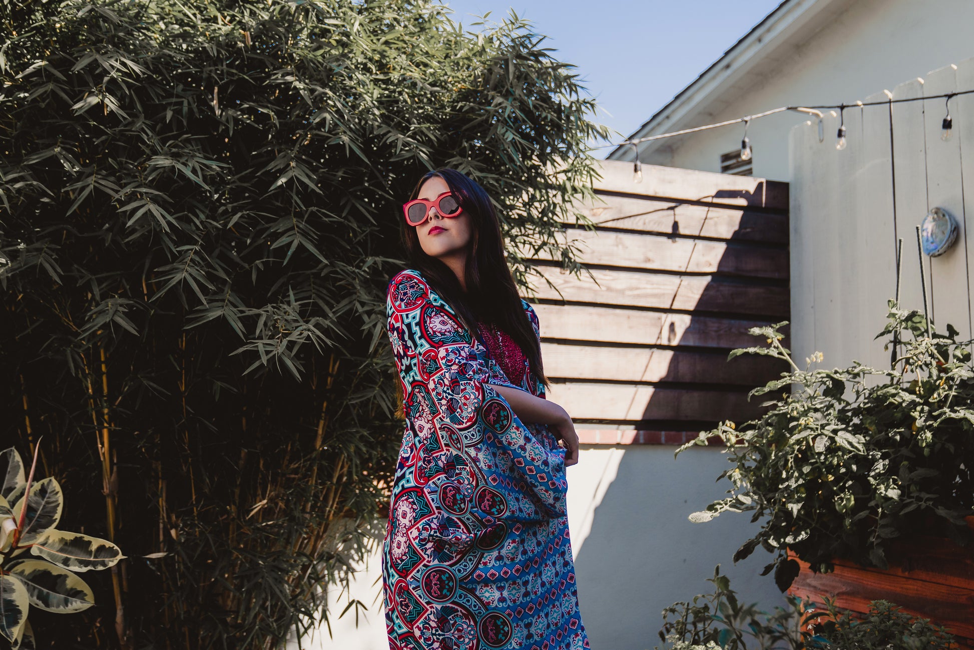 This Persephone Royale Caftan features a beautiful mosaic tile and Greek bird print in royal blue, red, and hints of teal.