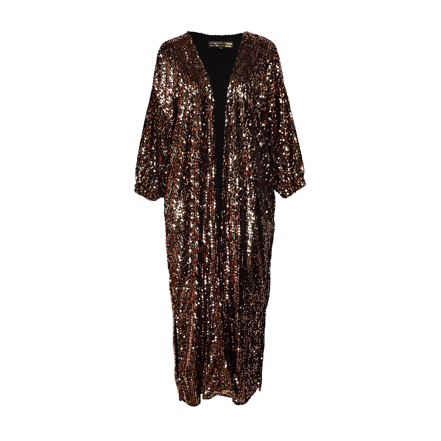 Ultra glamorous shimmering sequined cocoon jacket made from a soft black velvet inlaid with deep copper sequins and lined with soft black jersey. Featuring cocoon sleeves and pockets with a mid-shin hem.
