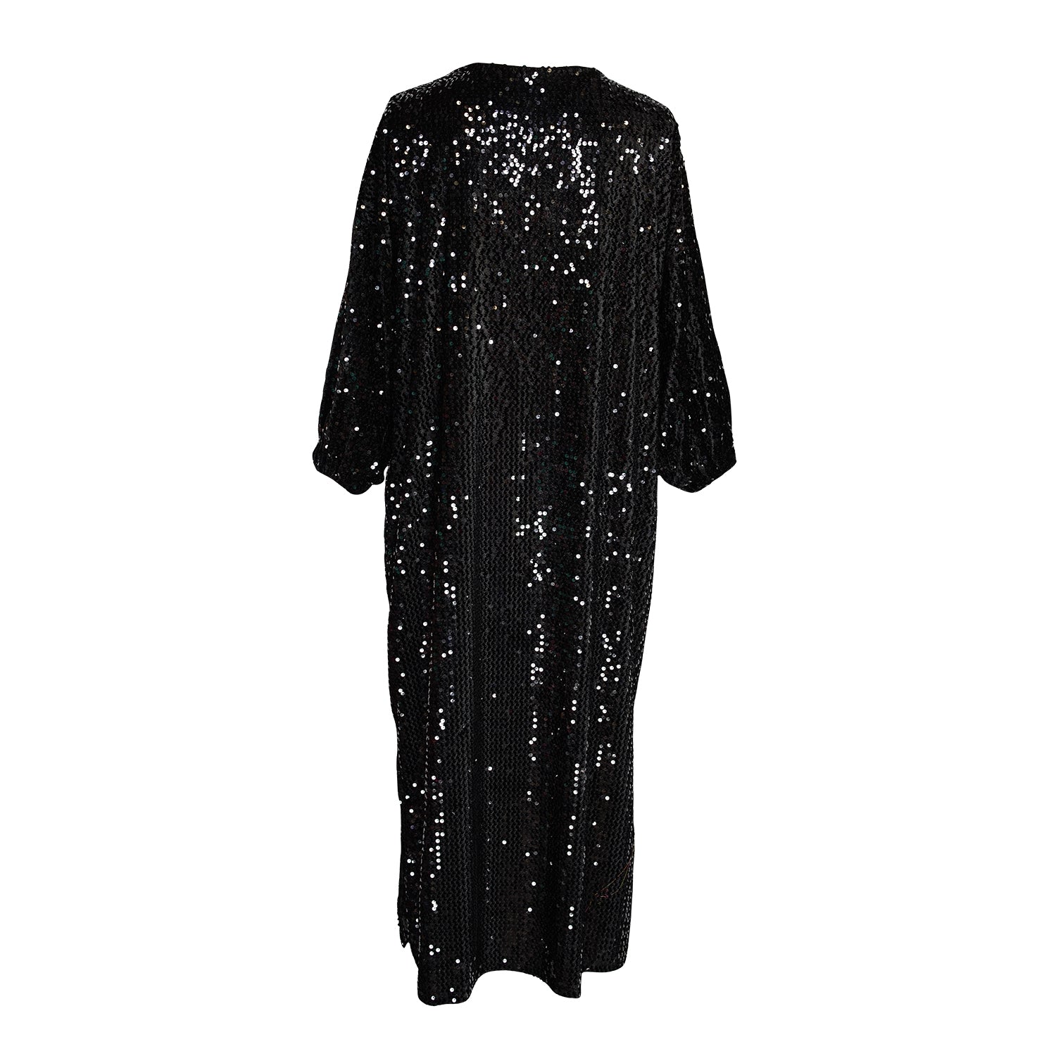 Ultra glamorous shimmering sequined cocoon jacket made from a soft black velvet inlaid with black sequins and lined with soft black jersey. Featuring cocoon sleeves and pockets with a mid-shin hem.