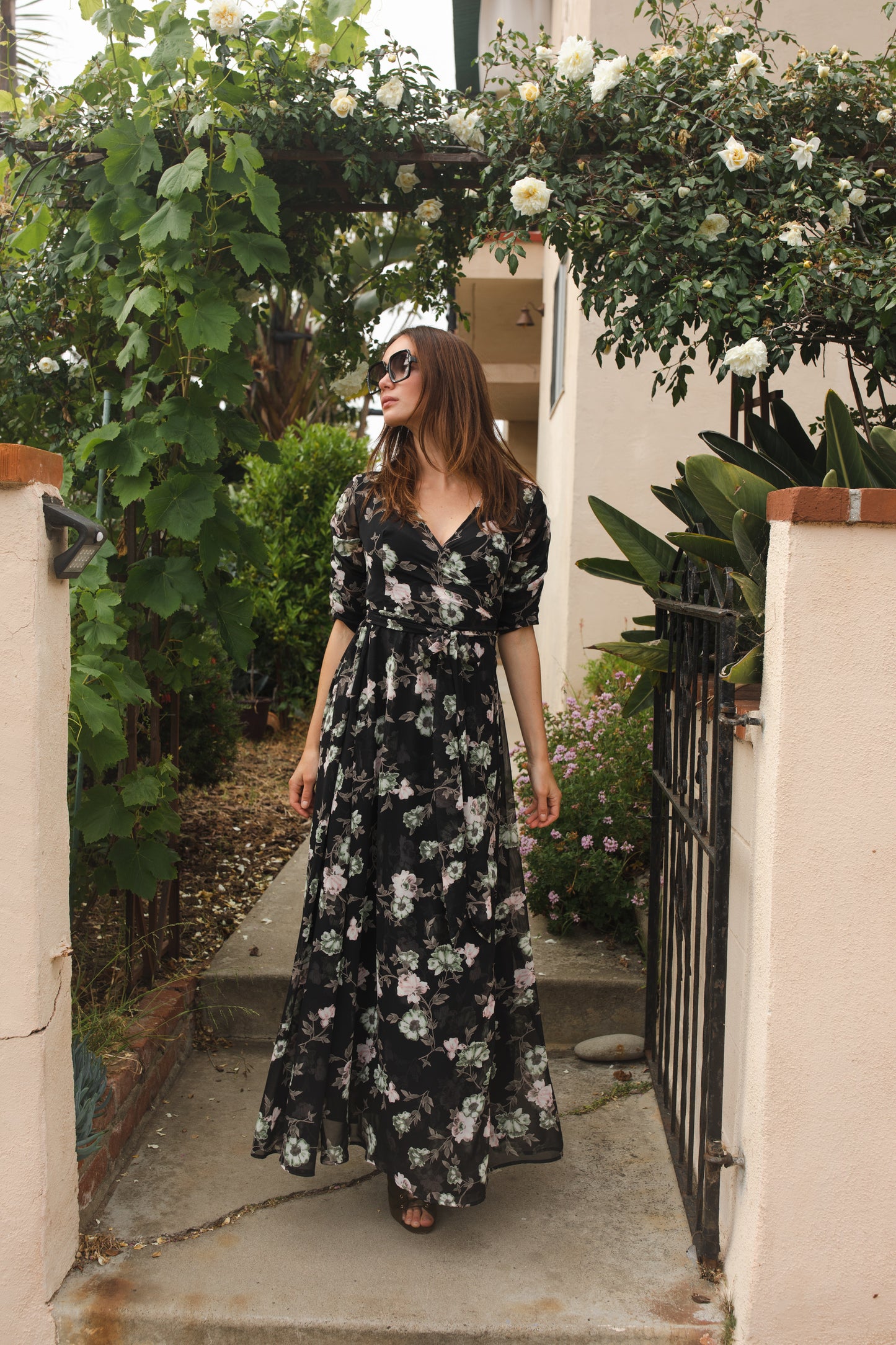 jennafer grace Signature Wrap Dress in Noir Garden onyx black maxi dress with pastel floral flower print with long waist tie and ruched sleeves boho bohemian hippie romantic whimsical spring gown wedding guest dress unisex handmade