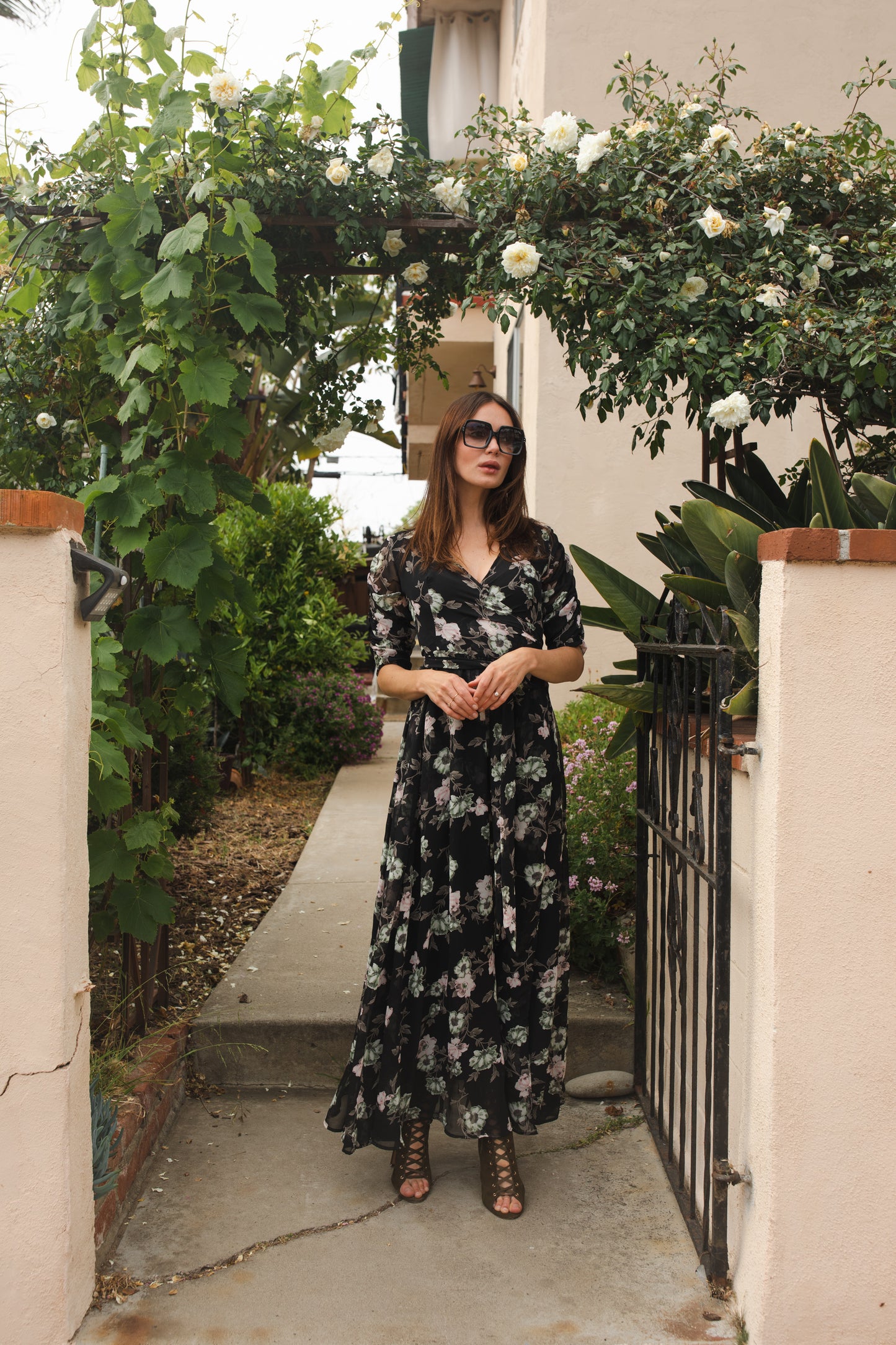 jennafer grace Signature Wrap Dress in Noir Garden onyx black maxi dress with pastel floral flower print with long waist tie and ruched sleeves boho bohemian hippie romantic whimsical spring gown wedding guest dress unisex handmade