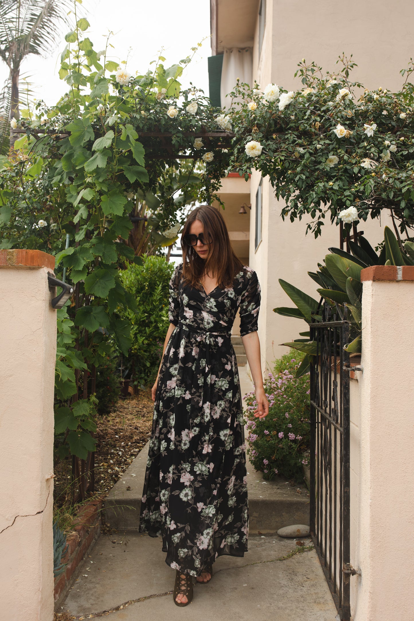 jennafer grace Signature Wrap Dress in Noir Garden onyx black maxi dress with pastel floral flower print with long waist tie and ruched sleeves boho bohemian hippie romantic whimsical spring gown wedding guest dress unisex handmade