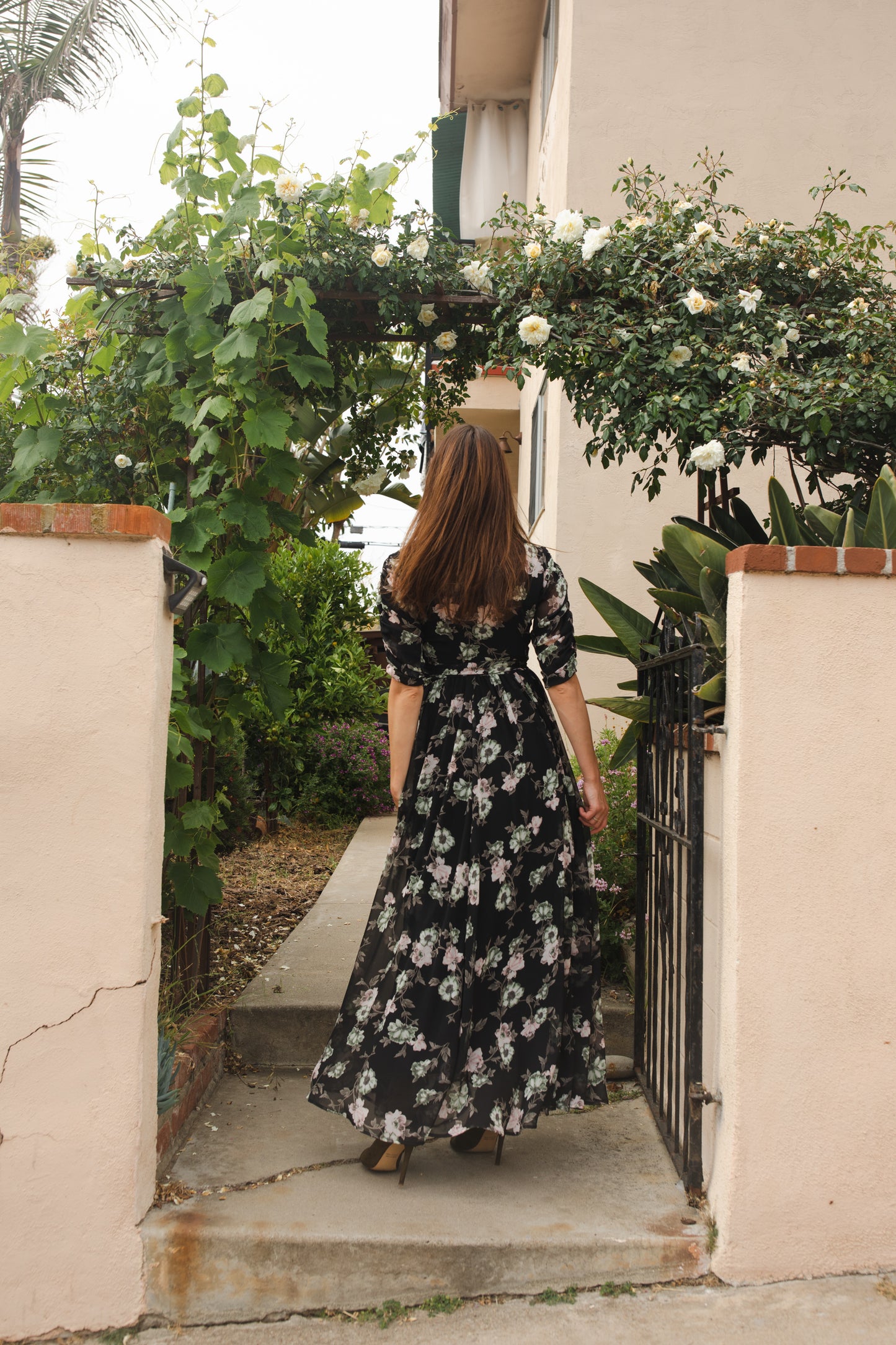 jennafer grace Signature Wrap Dress in Noir Garden onyx black maxi dress with pastel floral flower print with long waist tie and ruched sleeves boho bohemian hippie romantic whimsical spring gown wedding guest dress unisex handmade