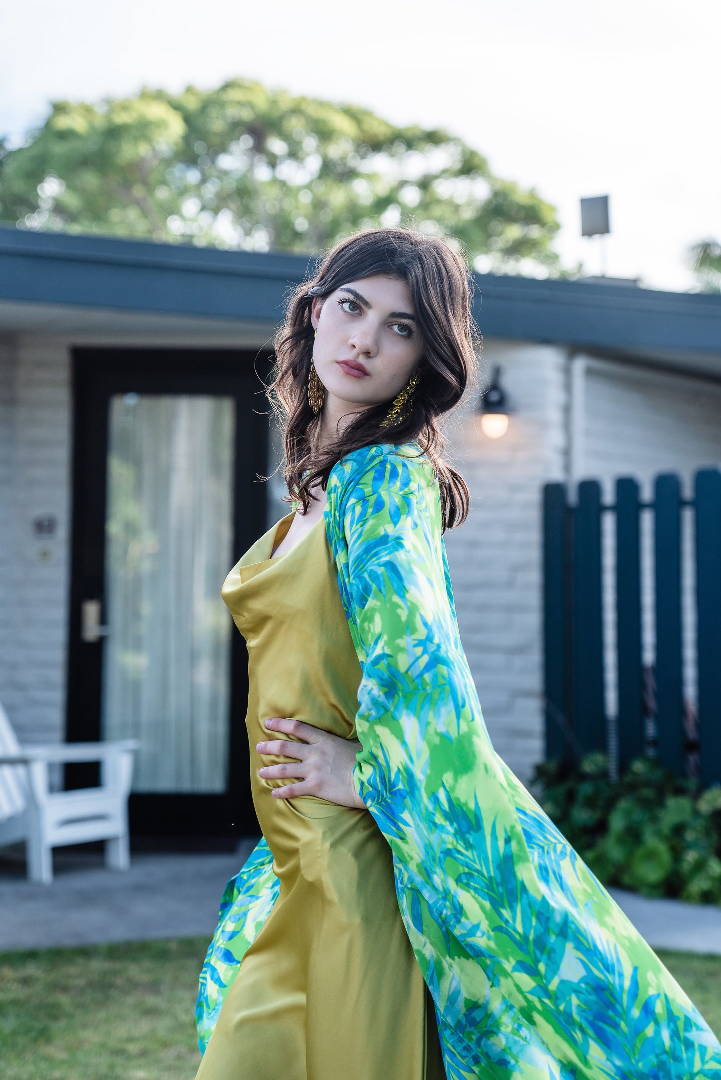 The Biscayne Kimono robe presents a striking combination of pulsating Miami Beach colors: vibrant shades of acid green, turquoise, and aqua. Featuring traditional square sleeves, matching waist tie, deep side pockets, and an ankle length hem.