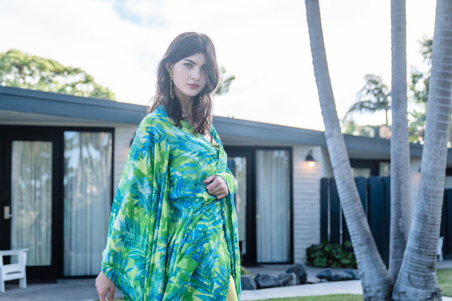 The Biscayne Kimono robe presents a striking combination of pulsating Miami Beach colors: vibrant shades of acid green, turquoise, and aqua. Featuring traditional square sleeves, matching waist tie, deep side pockets, and an ankle length hem.