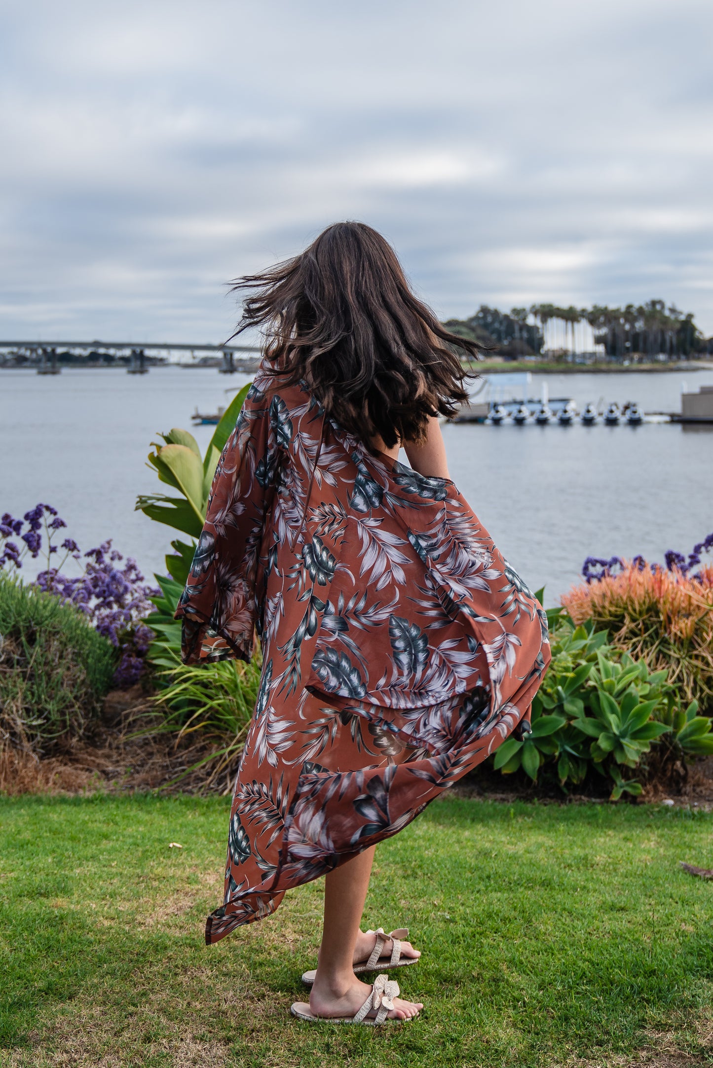 Our Dusk Palms Kimono features a delicate blend of warm brown and olive palm fronds, and is made from a soft, floaty and airy fabric