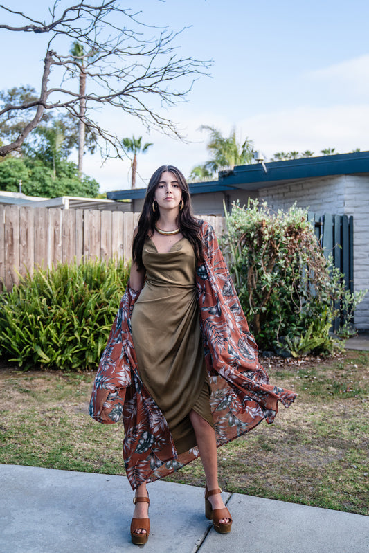 Our Dusk Palms Kimono features a delicate blend of warm brown and olive palm fronds, and is made from a soft, floaty and airy fabric