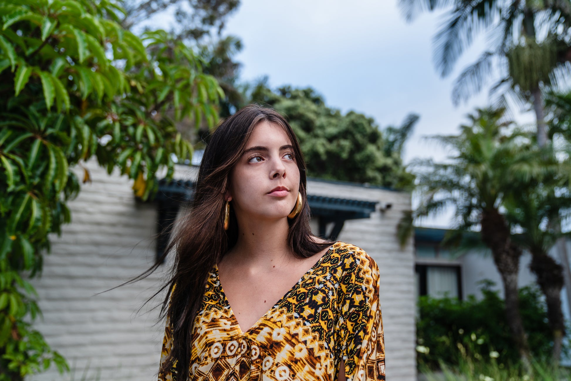 This retro tiki inspired caftan has bold colors and intricate patterns 