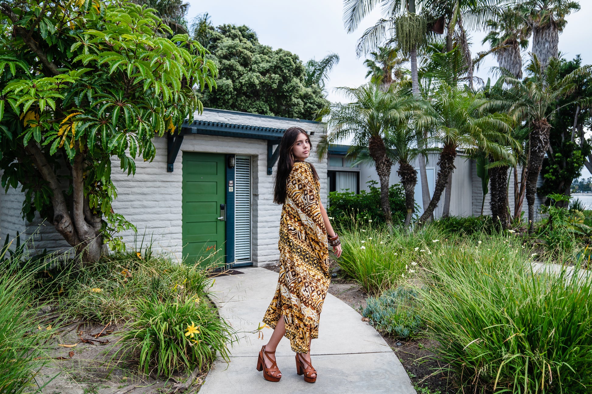 This retro tiki inspired caftan has bold colors and intricate patterns 