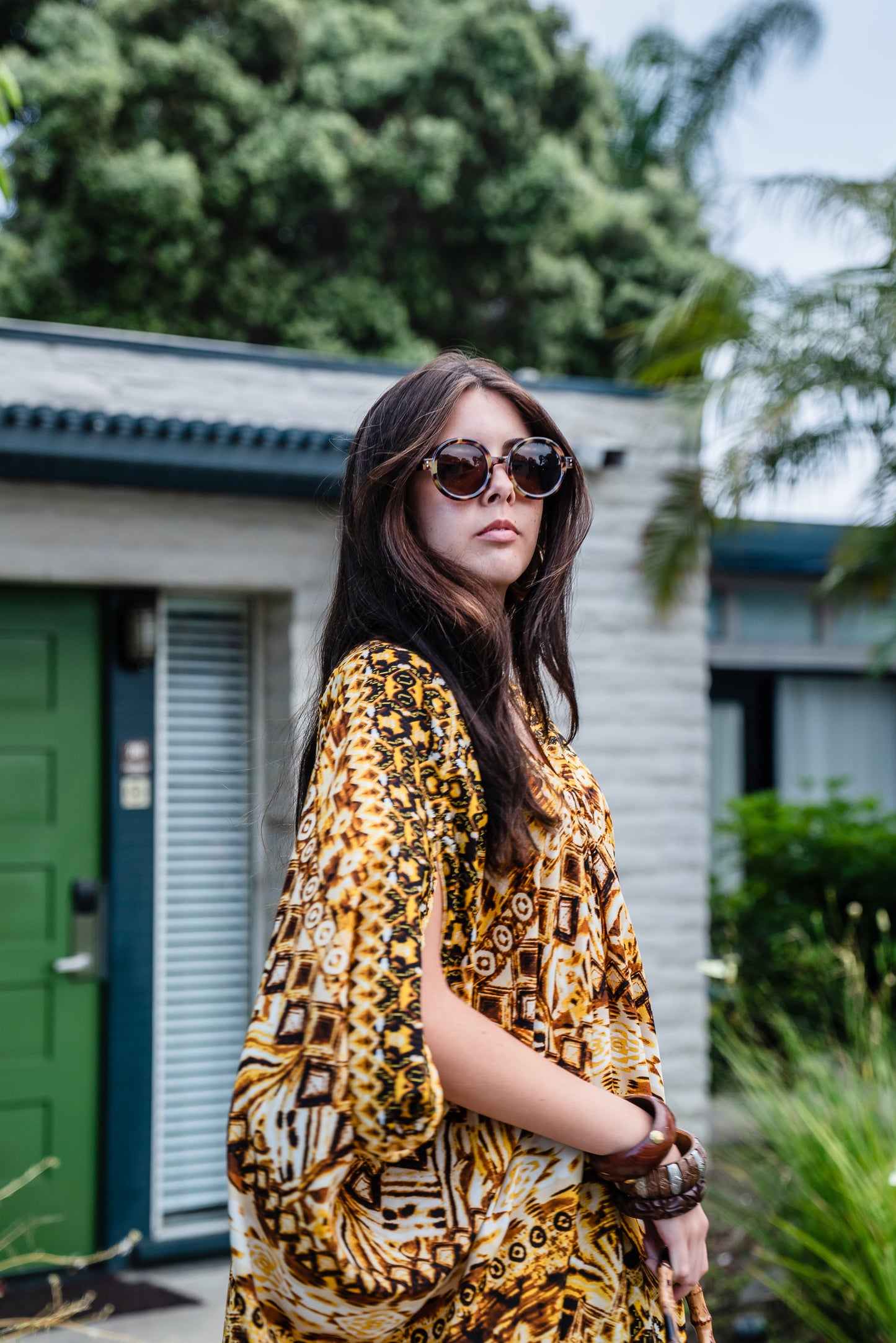 This retro tiki inspired caftan has bold colors and intricate patterns 
