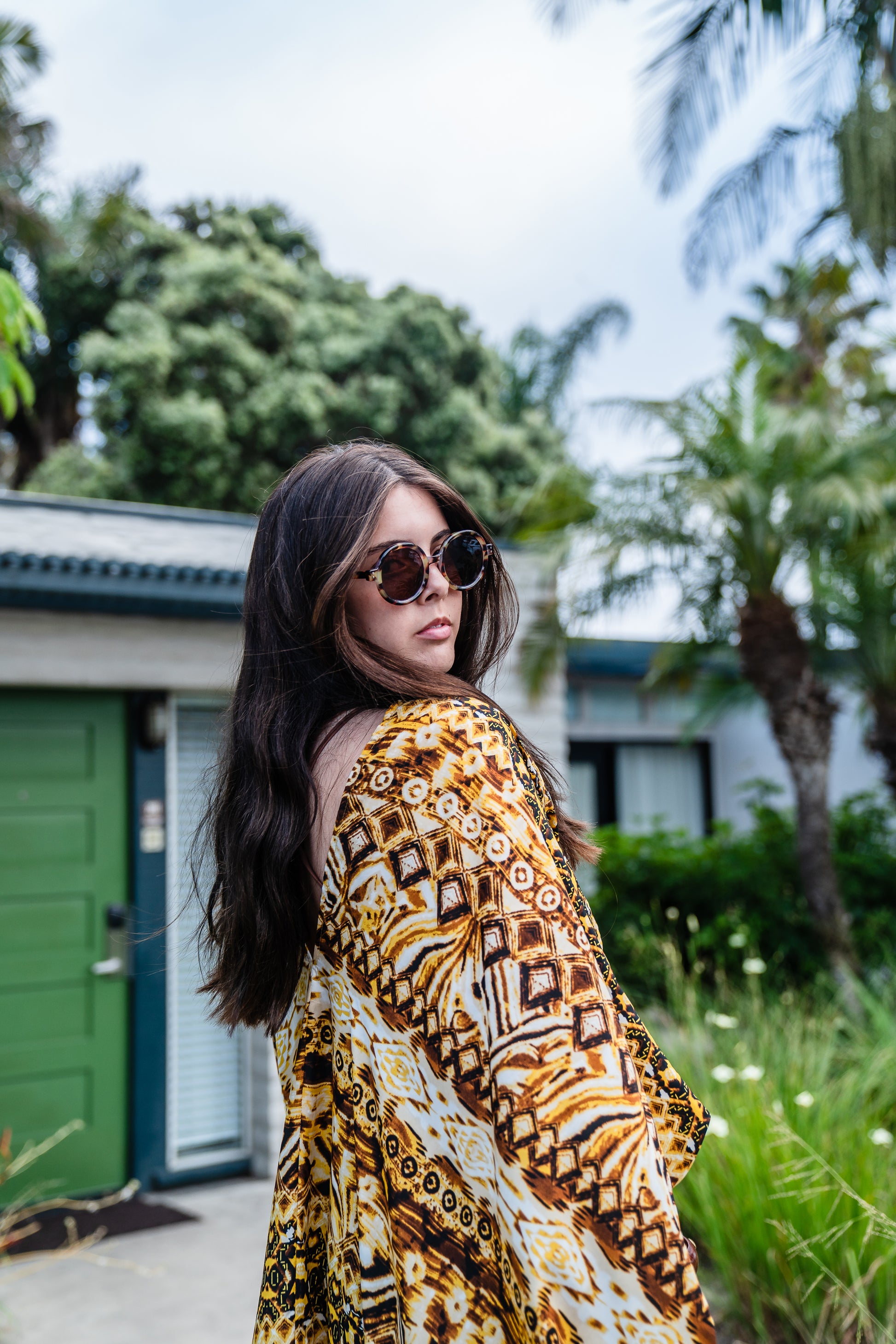 This retro tiki inspired caftan has bold colors and intricate patterns 