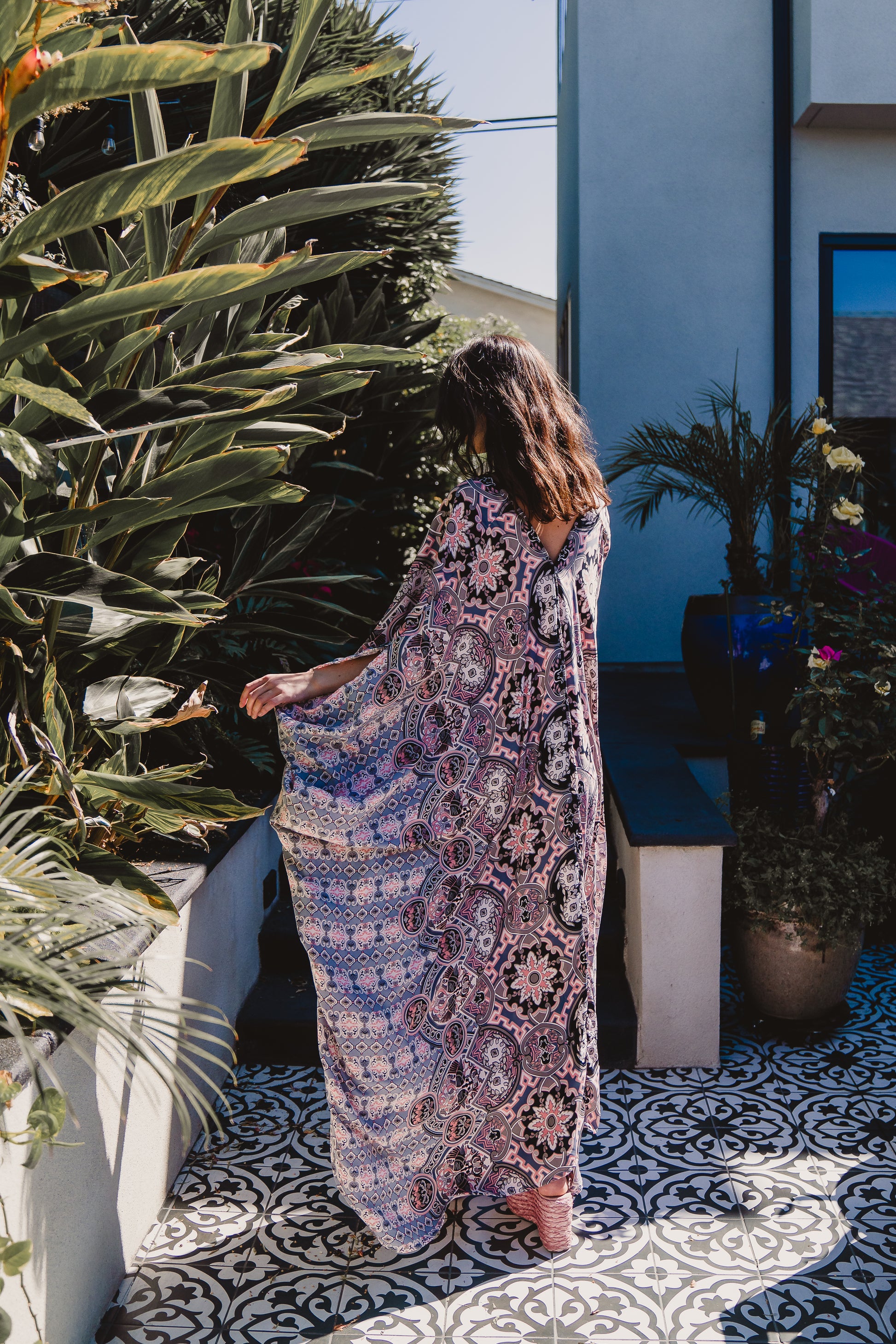 This Persephone Rose Caftan features a beautiful mosaic tile and Greek bird print in pink, grey, and hints of black.