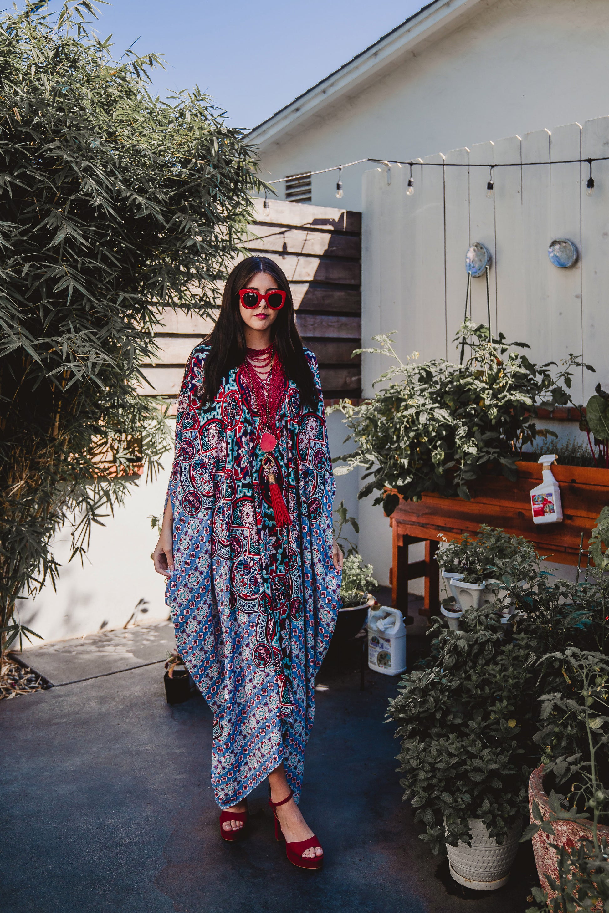 This Persephone Royale Caftan features a beautiful mosaic tile and Greek bird print in royal blue, red, and hints of teal.