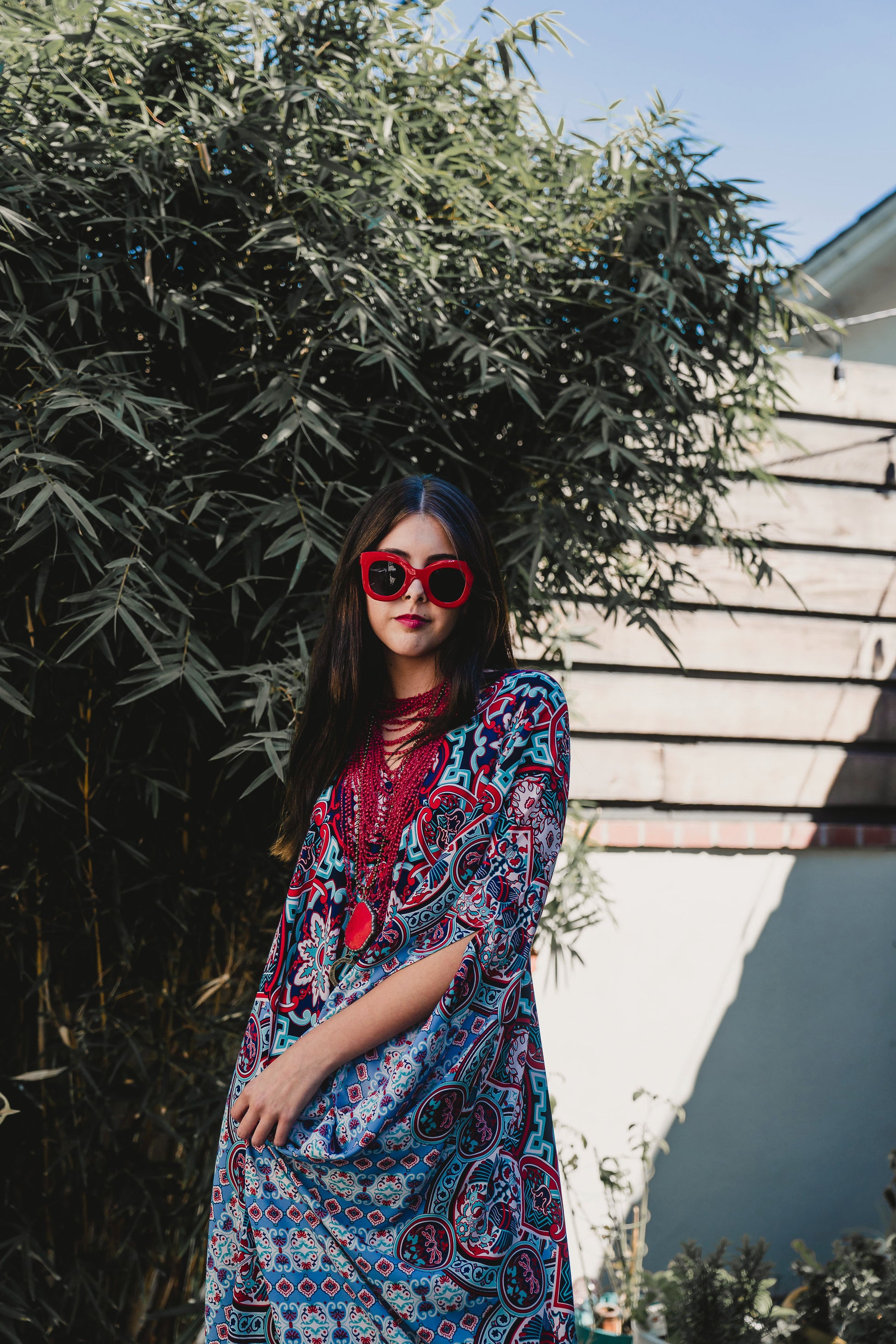 This Persephone Royale Caftan features a beautiful mosaic tile and Greek bird print in royal blue, red, and hints of teal.