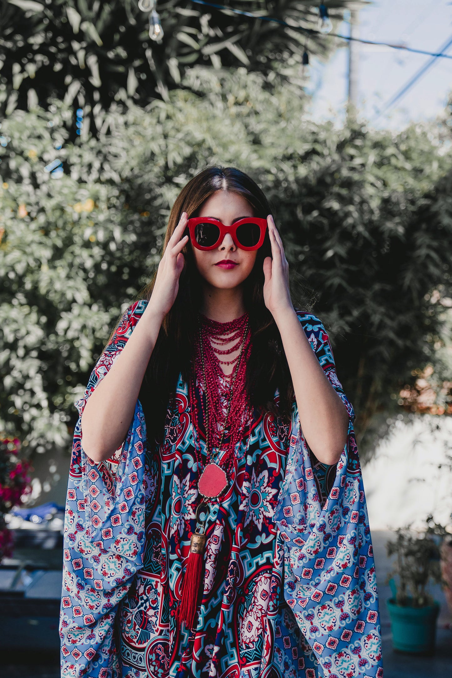 This Persephone Royale Caftan features a beautiful mosaic tile and Greek bird print in royal blue, red, and hints of teal.