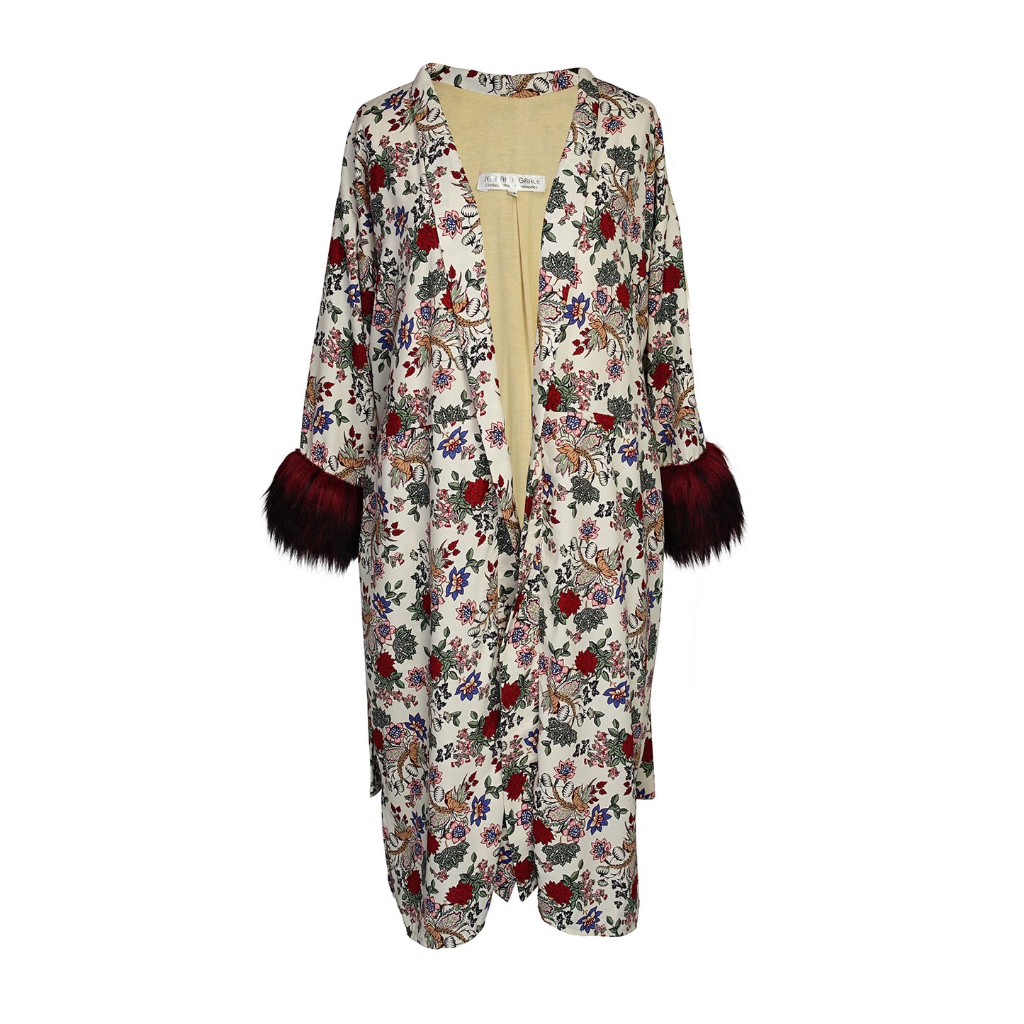 Slim 3/4 sleeve Koi Kimono features a fold-over lapel panel, deep front pockets, knee length hem, and a nice long waist tie. Made from a linen-like rayon fabric in red, yellow, blue, and green floral print on cream base and oxblood faux fur sleeve cuffs.