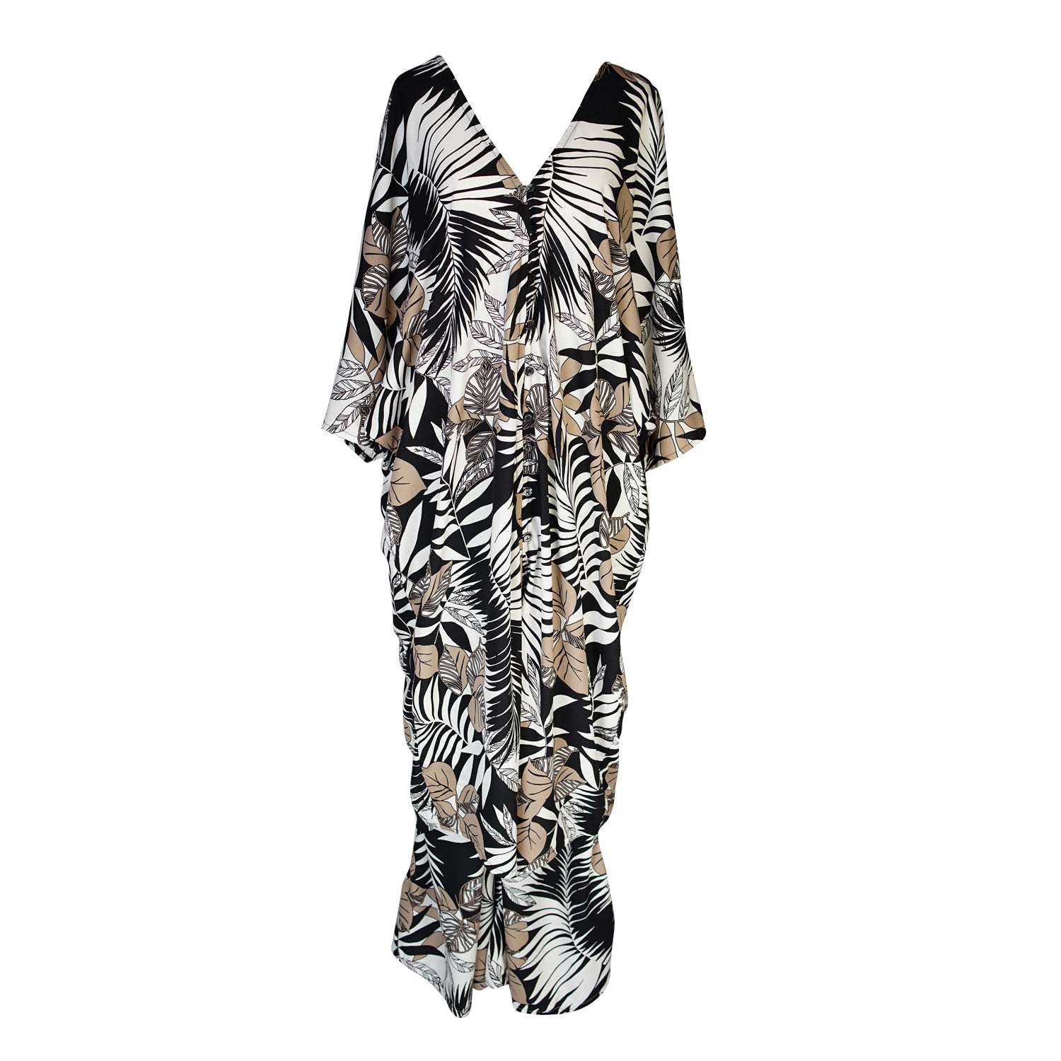 Midi length caftan tunic featuring white and tan palm leaf print on black. With v-neck, button up front, cutout at upper back with shoulder tie, and matching palazzo pant. Tropical bohemian chic aesthetic.