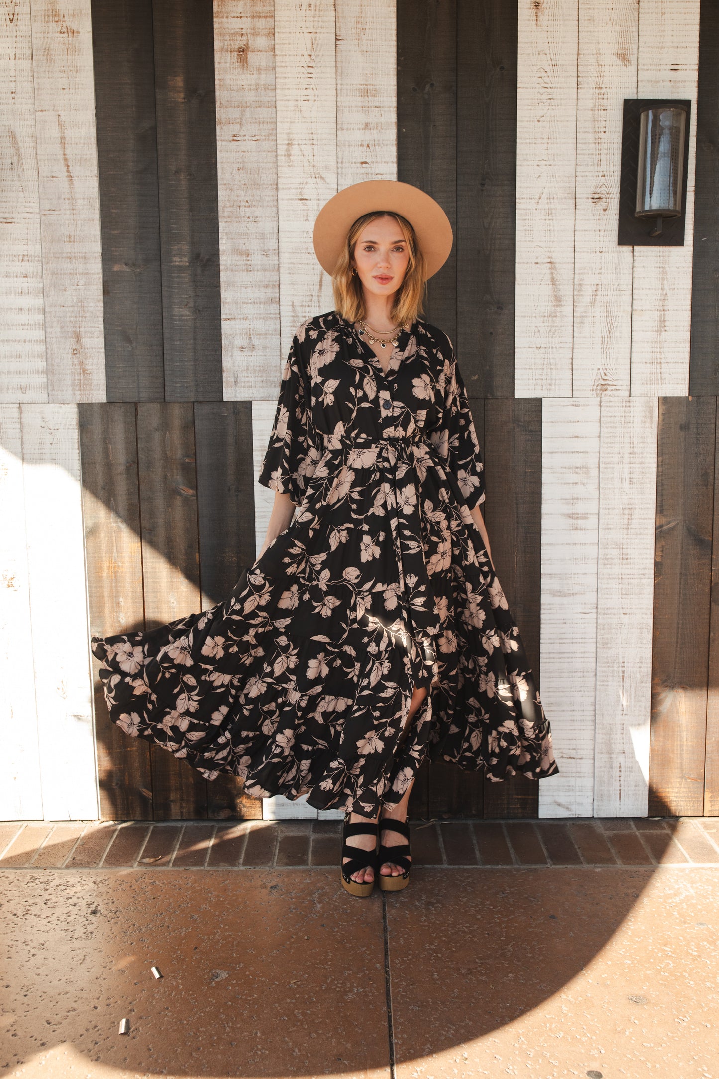 This beautiful maxi dress is made from a feminine floral fabric and comes with an optional sash belt.